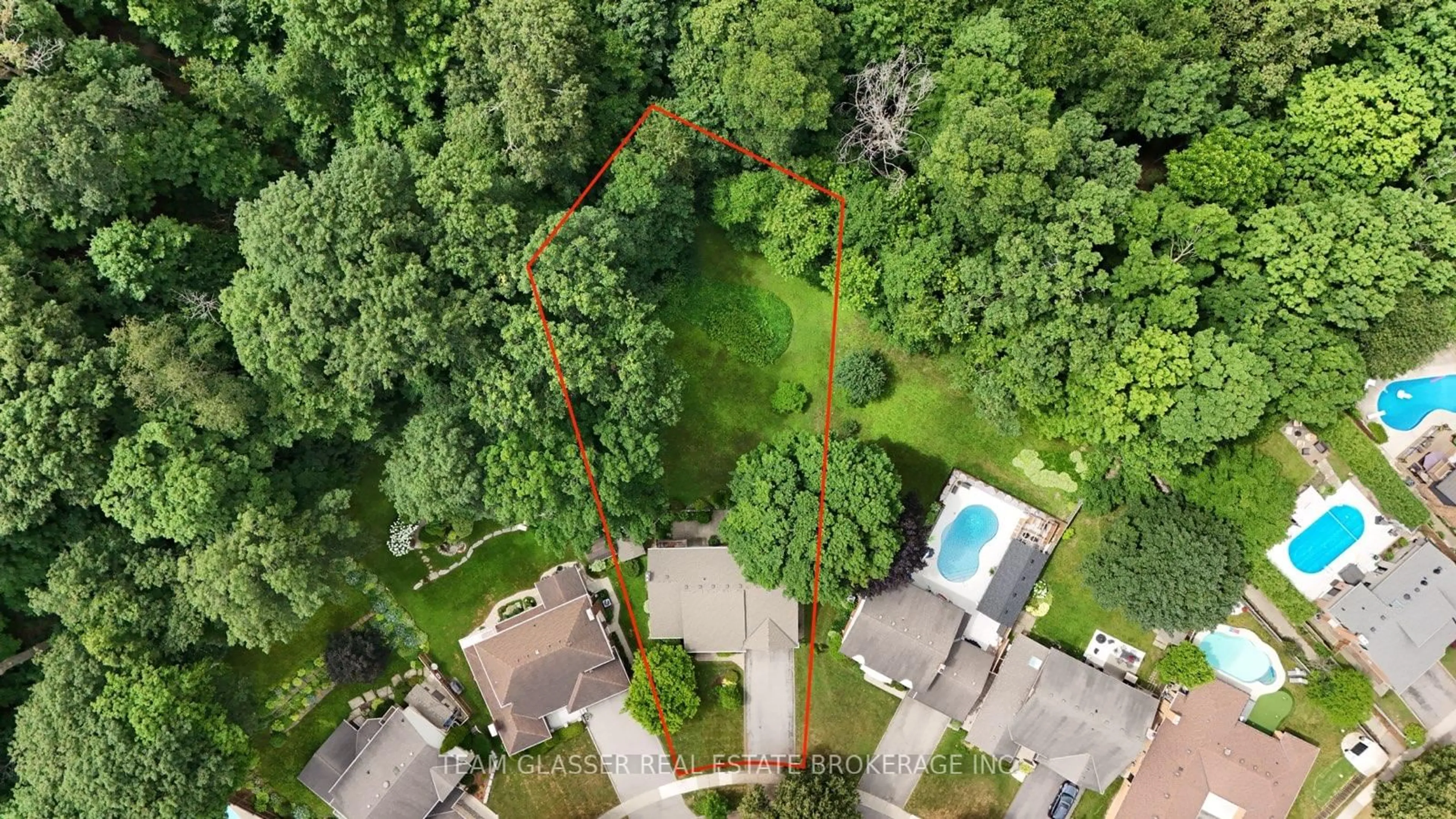 A pic from outside/outdoor area/front of a property/back of a property/a pic from drone, forest/trees view for 7 Robinwood Cres, London South Ontario N6K 3B2