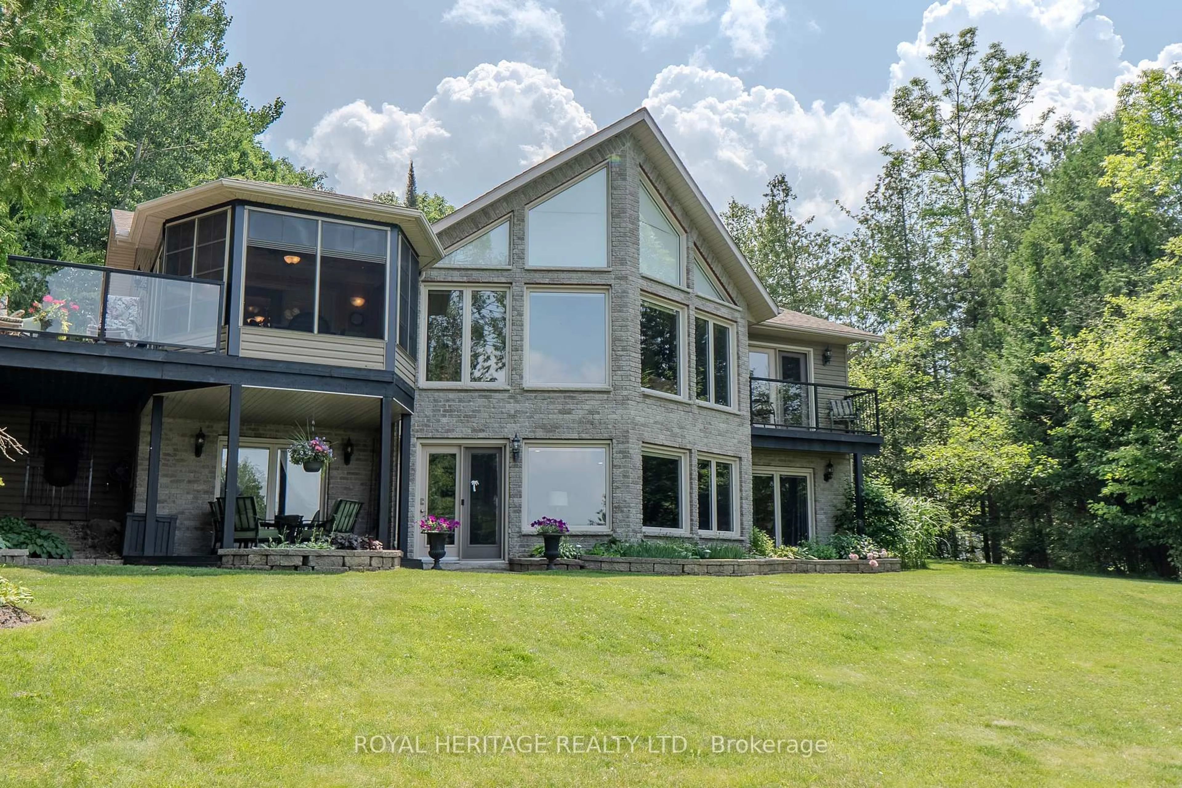 A pic from outside/outdoor area/front of a property/back of a property/a pic from drone, water/lake/river/ocean view for 47 Cedar Bay Rd, East Ferris Ontario P0H 1B0