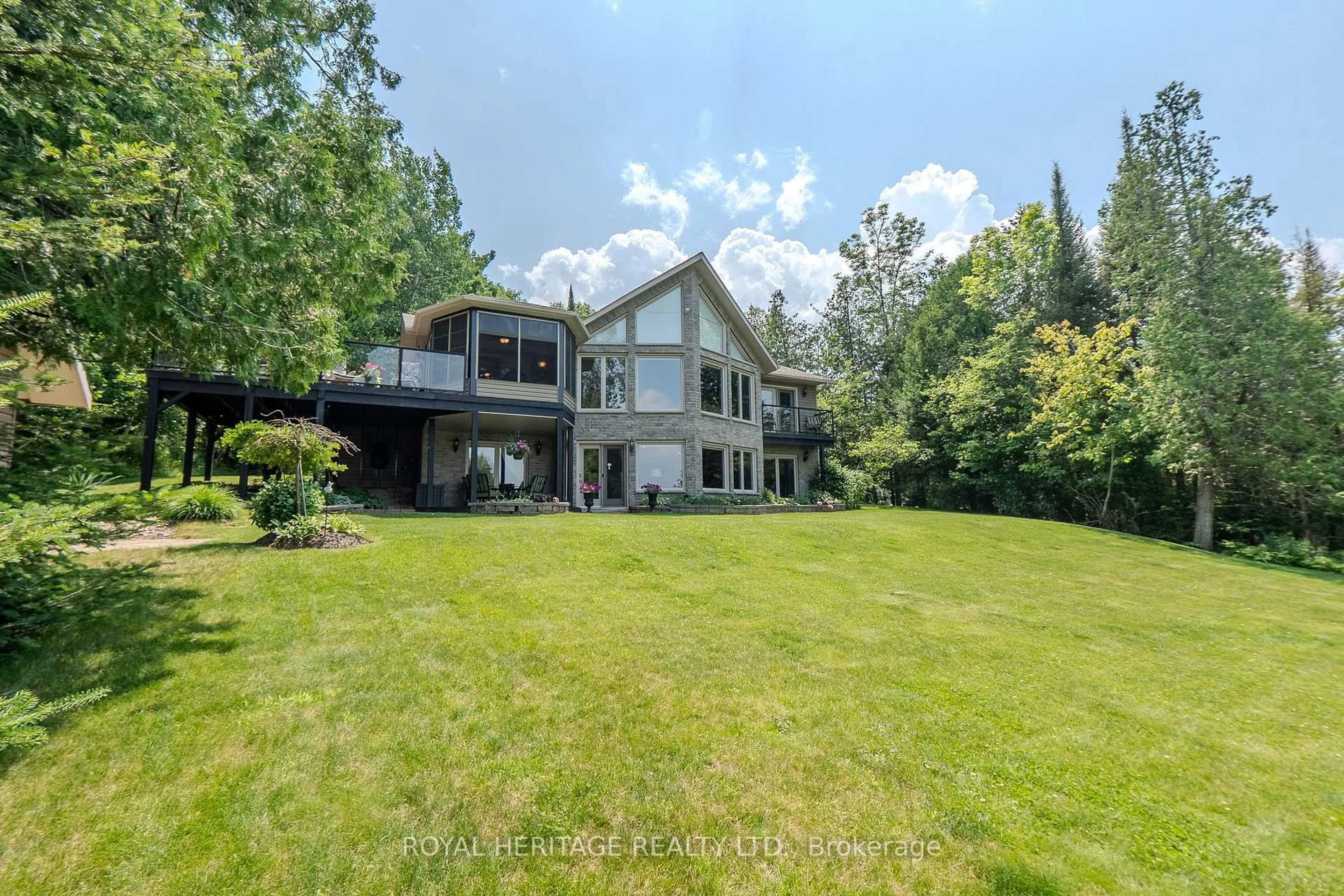 A pic from outside/outdoor area/front of a property/back of a property/a pic from drone, water/lake/river/ocean view for 47 Cedar Bay Rd, East Ferris Ontario P0H 1B0