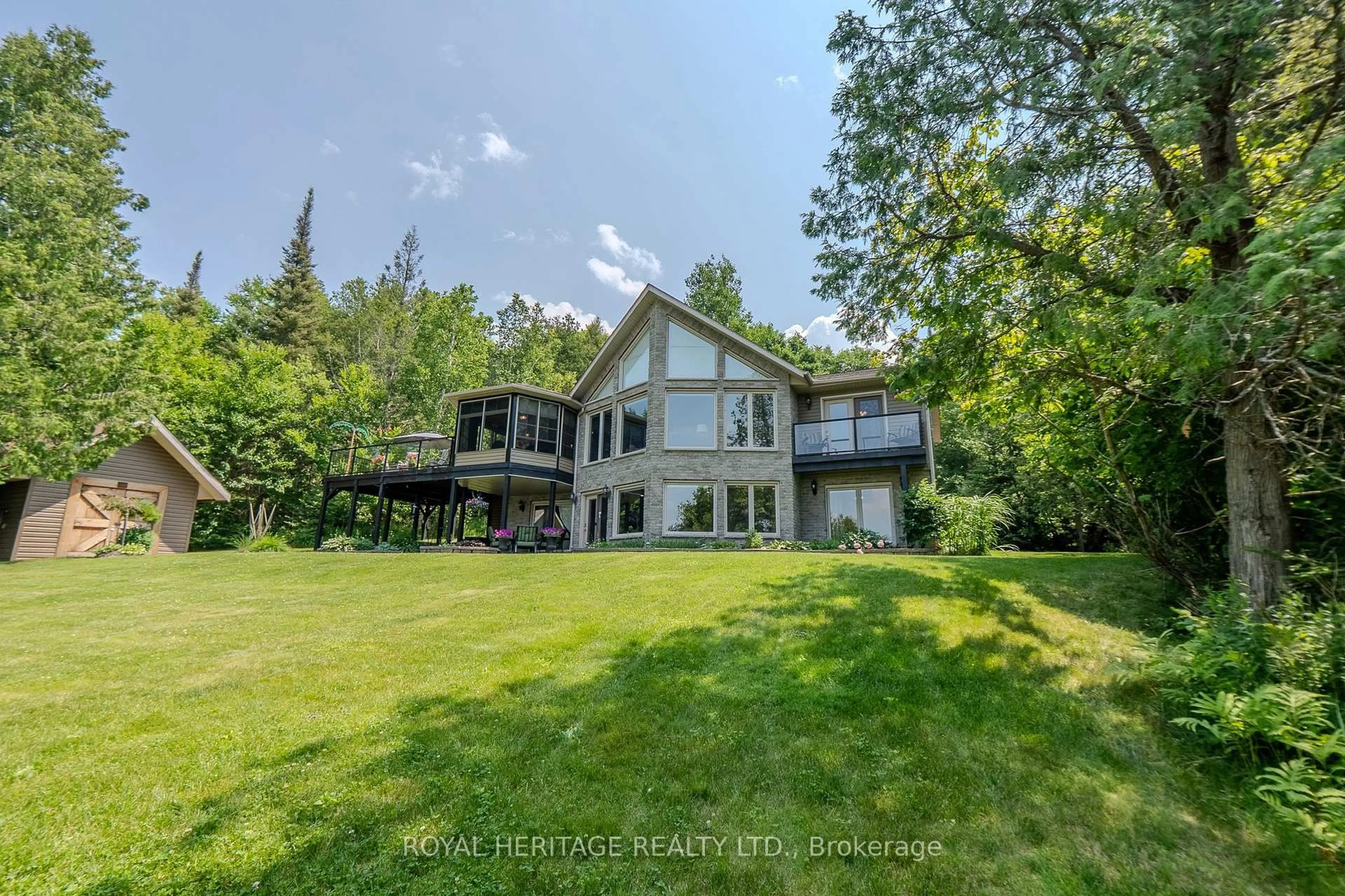 A pic from outside/outdoor area/front of a property/back of a property/a pic from drone, water/lake/river/ocean view for 47 Cedar Bay Rd, East Ferris Ontario P0H 1B0