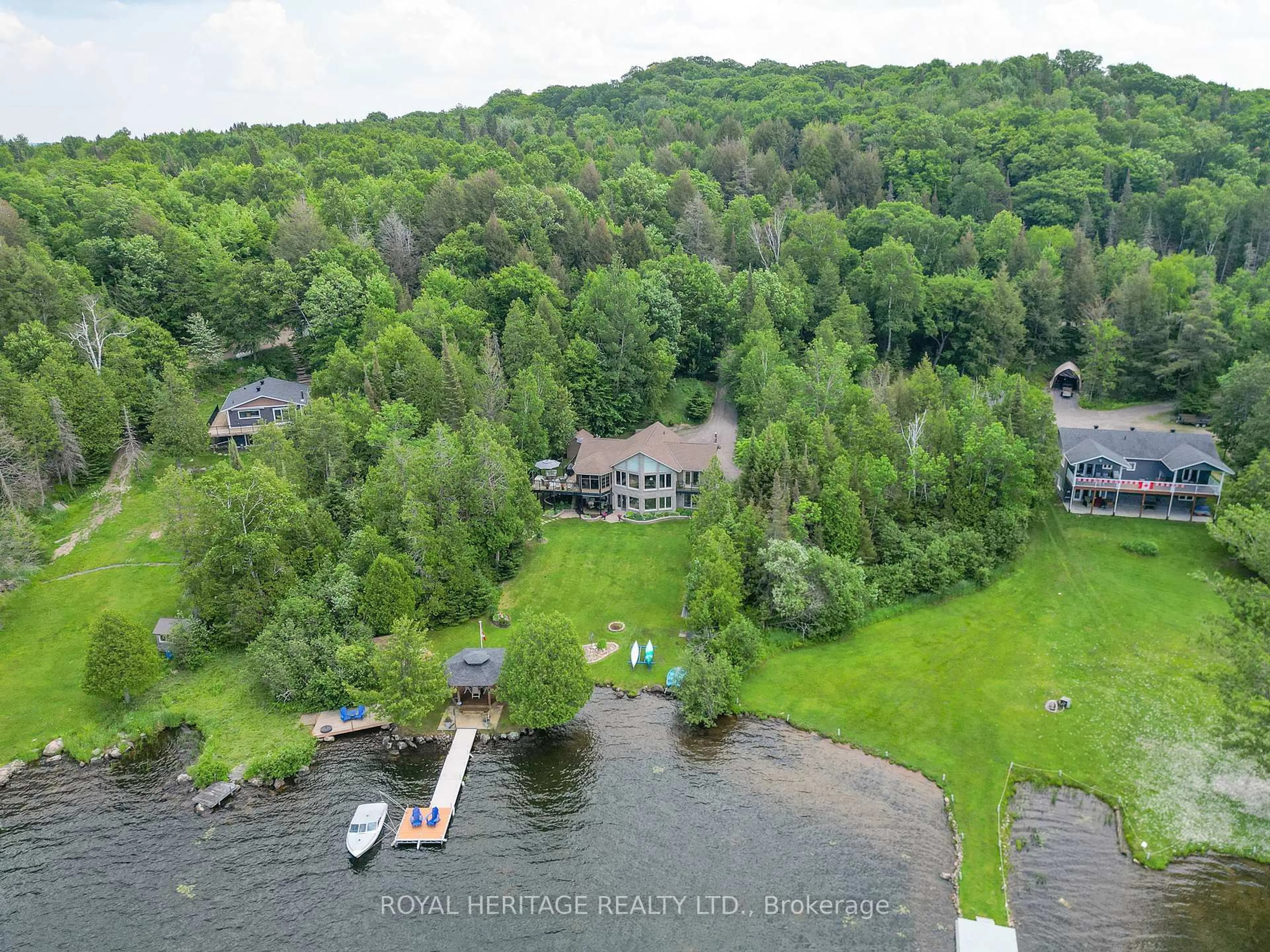 A pic from outside/outdoor area/front of a property/back of a property/a pic from drone, water/lake/river/ocean view for 47 Cedar Bay Rd, East Ferris Ontario P0H 1B0