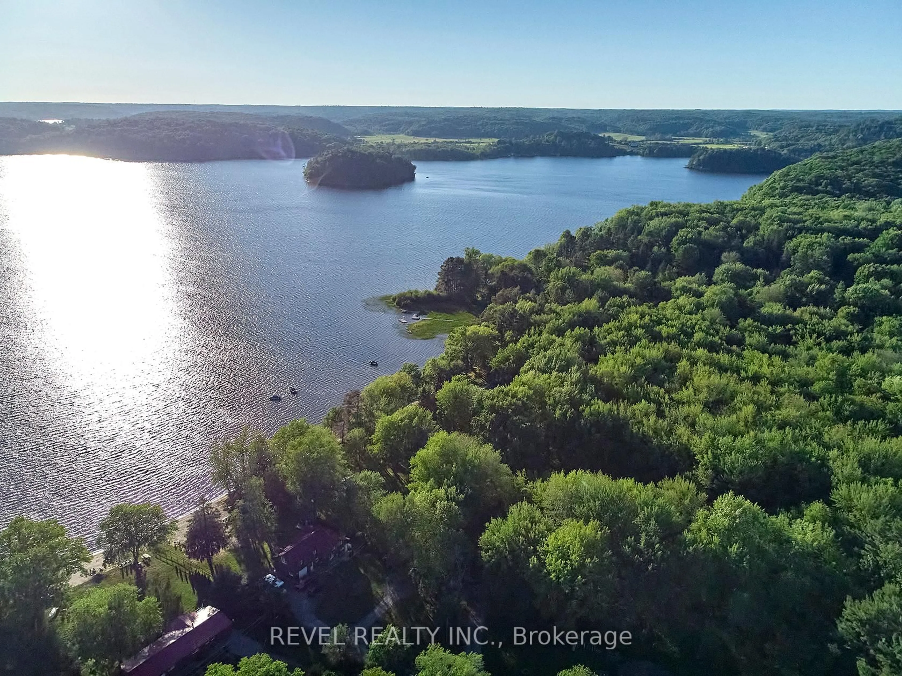 A pic from outside/outdoor area/front of a property/back of a property/a pic from drone, water/lake/river/ocean view for 1017 Wonder Beach Rd, Muskoka Lakes Ontario P0B 1M0