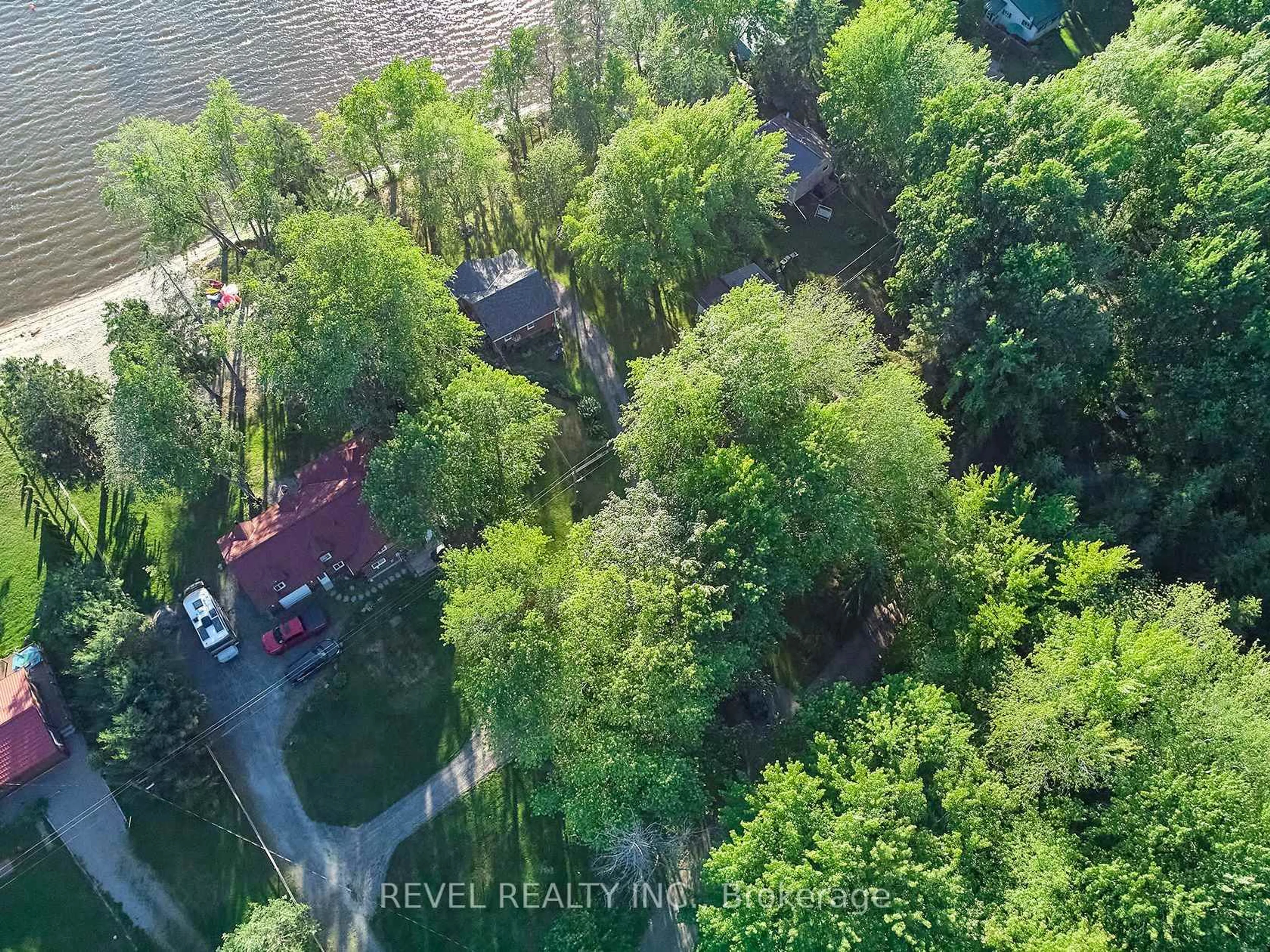 A pic from outside/outdoor area/front of a property/back of a property/a pic from drone, forest/trees view for 1017 Wonder Beach Rd, Muskoka Lakes Ontario P0B 1M0