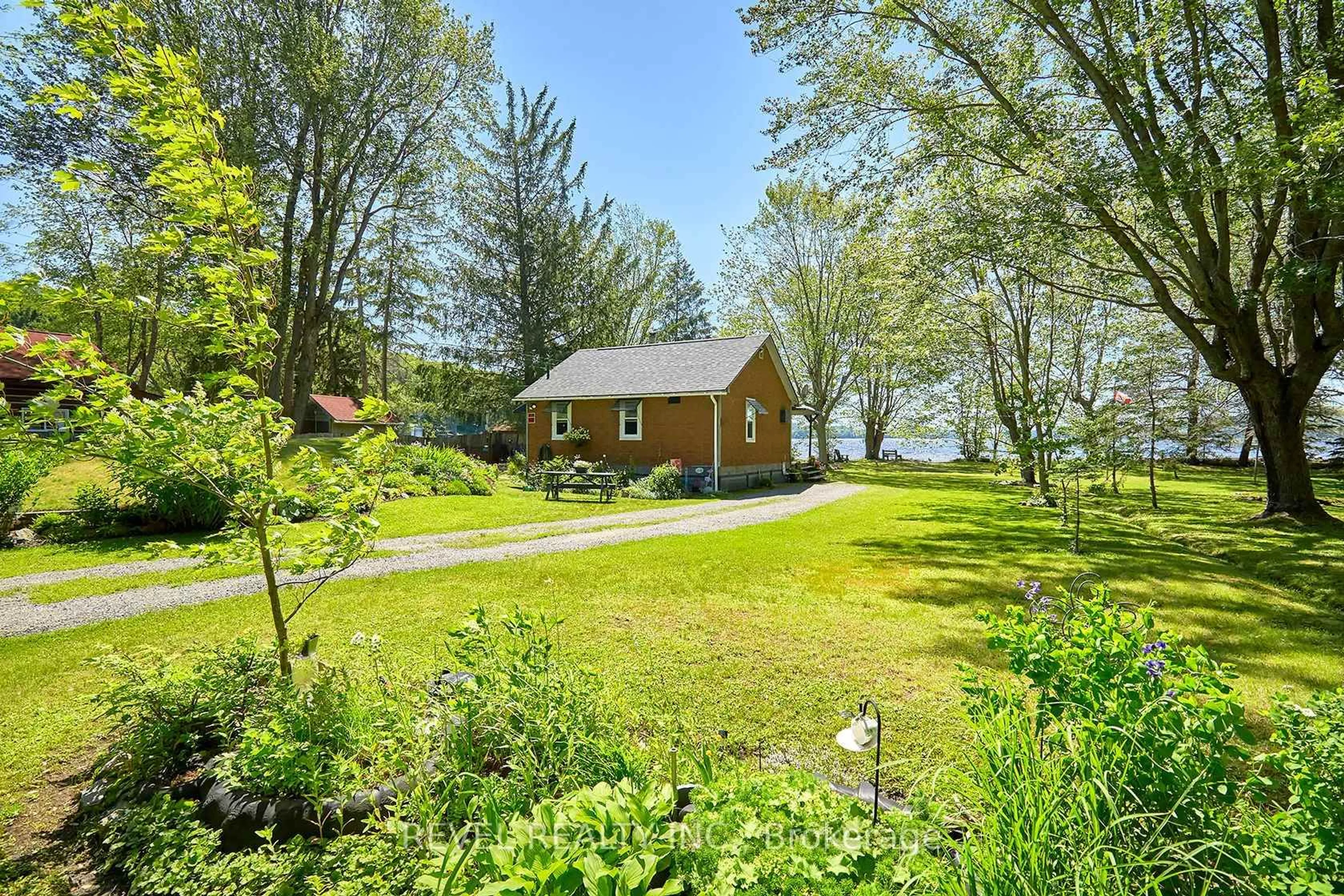 A pic from outside/outdoor area/front of a property/back of a property/a pic from drone, water/lake/river/ocean view for 1017 Wonder Beach Rd, Muskoka Lakes Ontario P0B 1M0