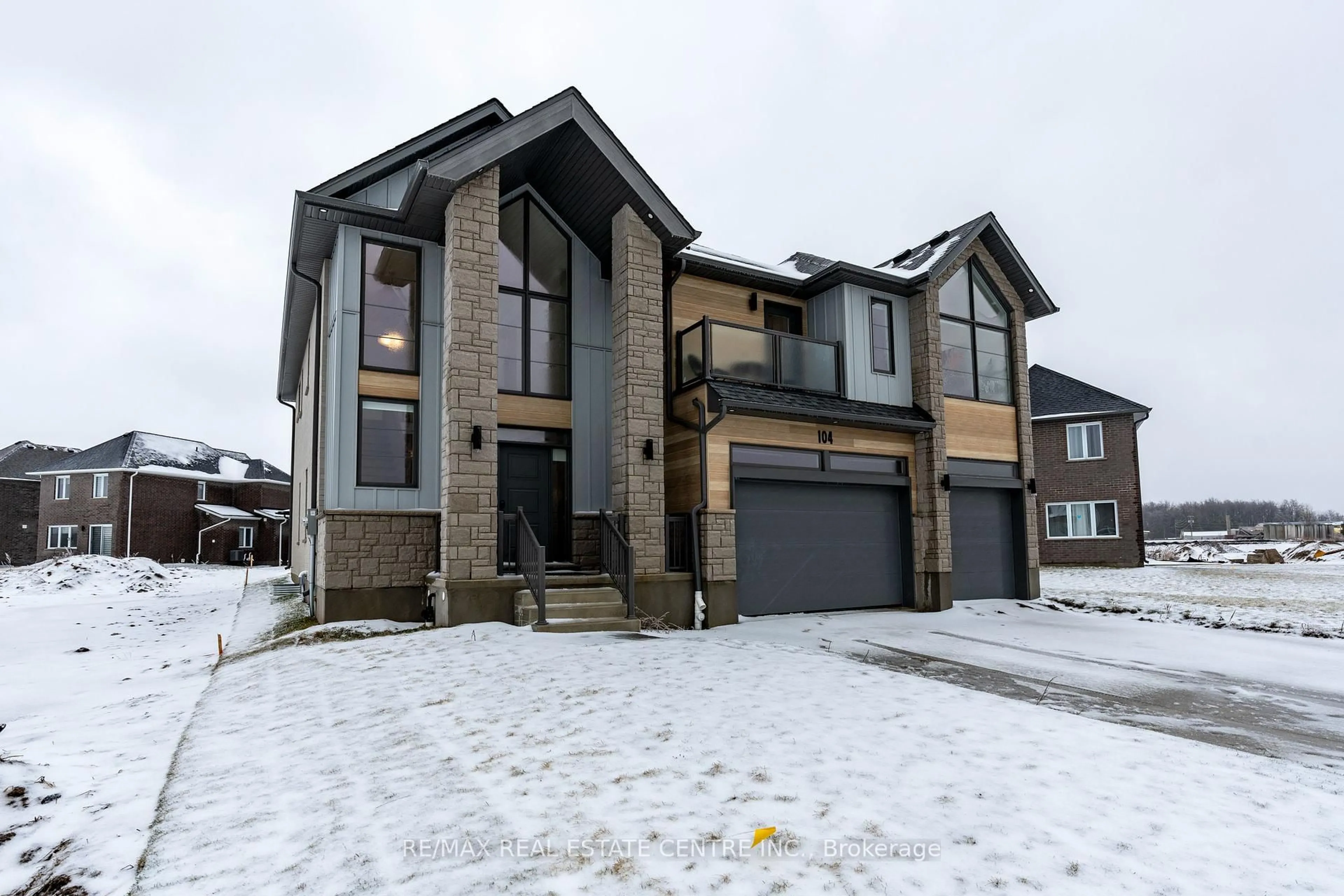 Home with brick exterior material, street for 104 Dempsey Dr, Stratford Ontario N5A 6S2