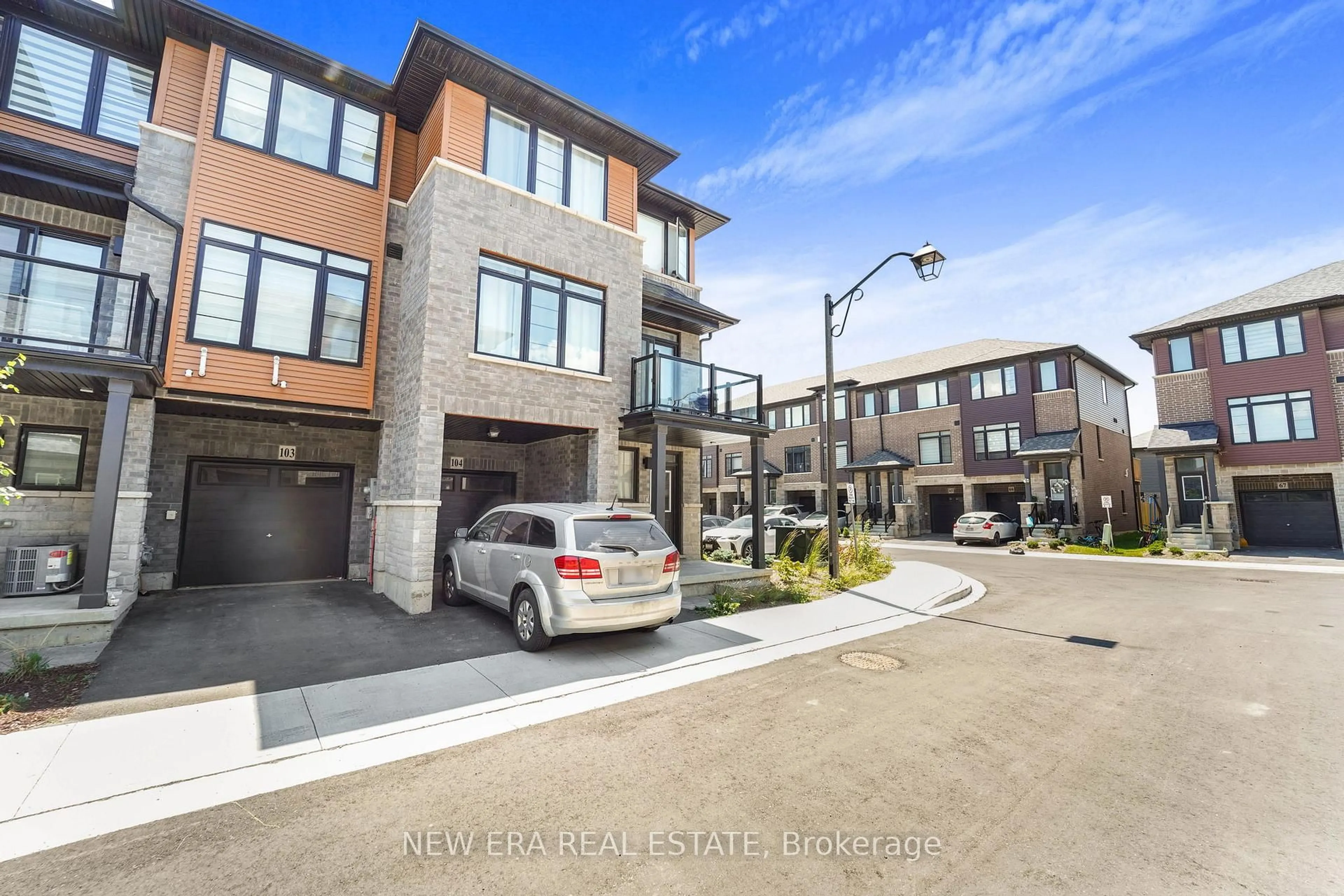 Home with brick exterior material, street for 461 Blackburn Dr #104, Brantford Ontario N3T 0W9