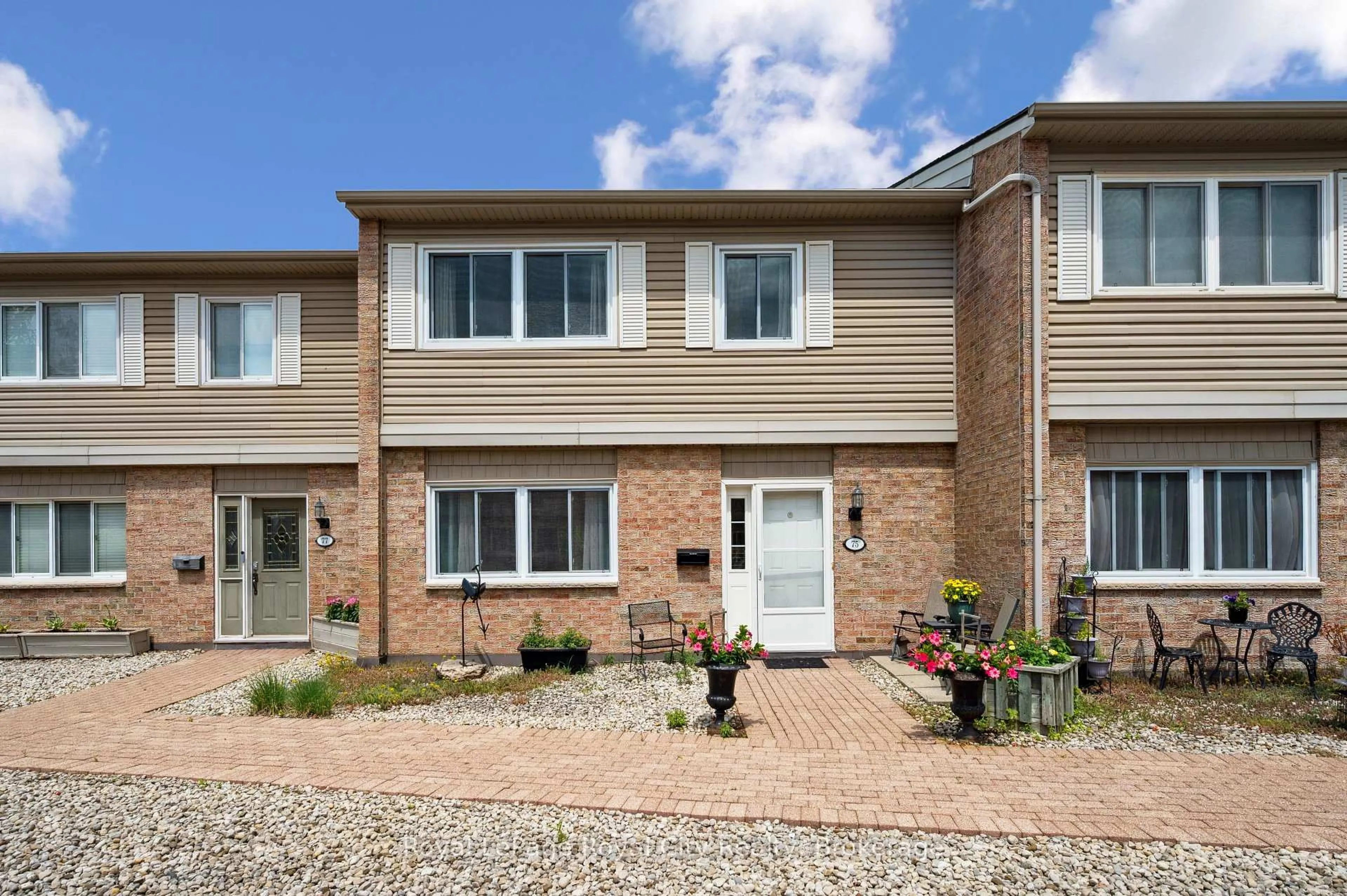 Home with brick exterior material, street for 295 Water St #75, Guelph Ontario N1G 2X5