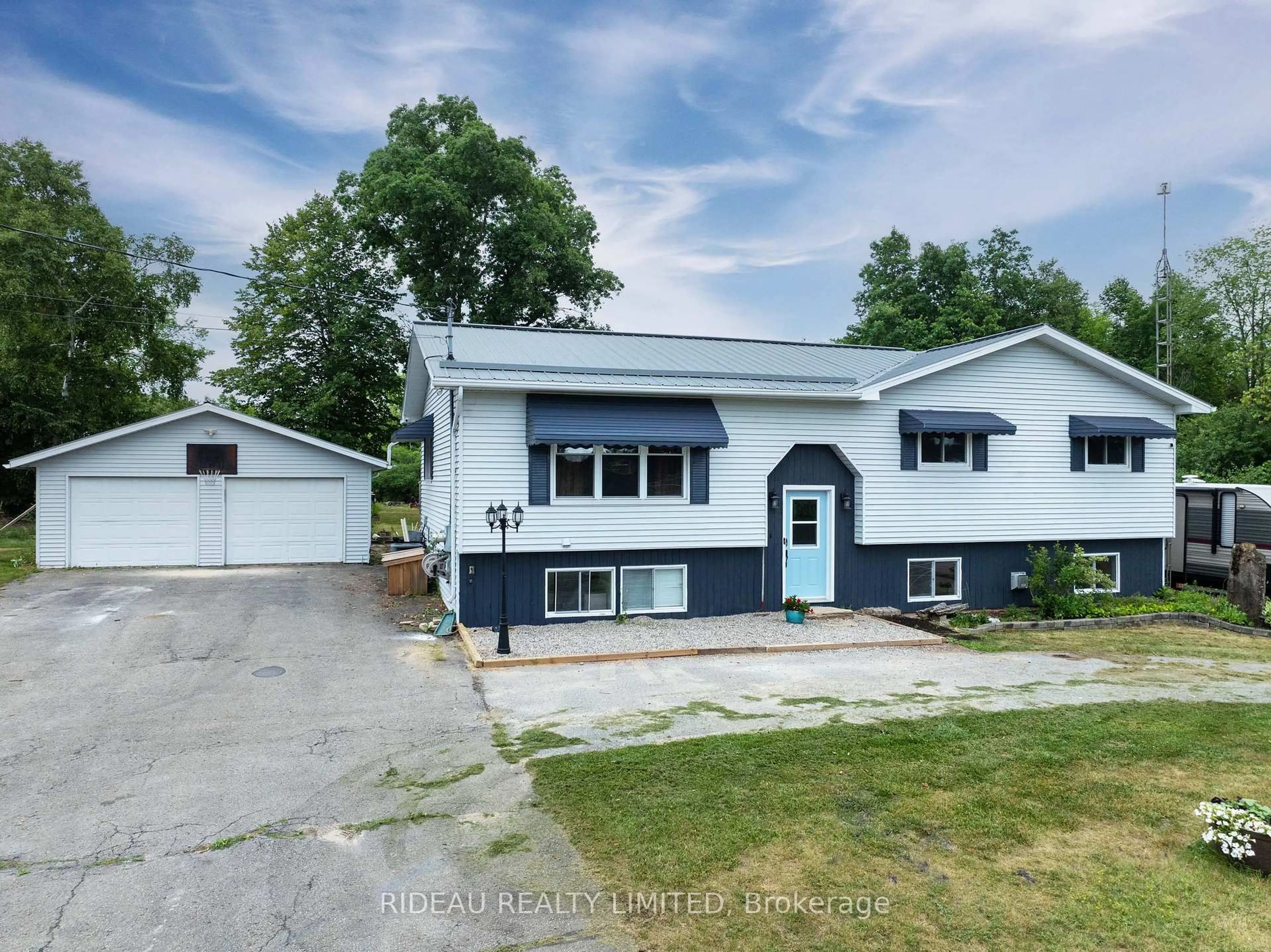 A pic from outside/outdoor area/front of a property/back of a property/a pic from drone, street for 275A Bay Rd, Rideau Lakes Ontario K0G 1L0