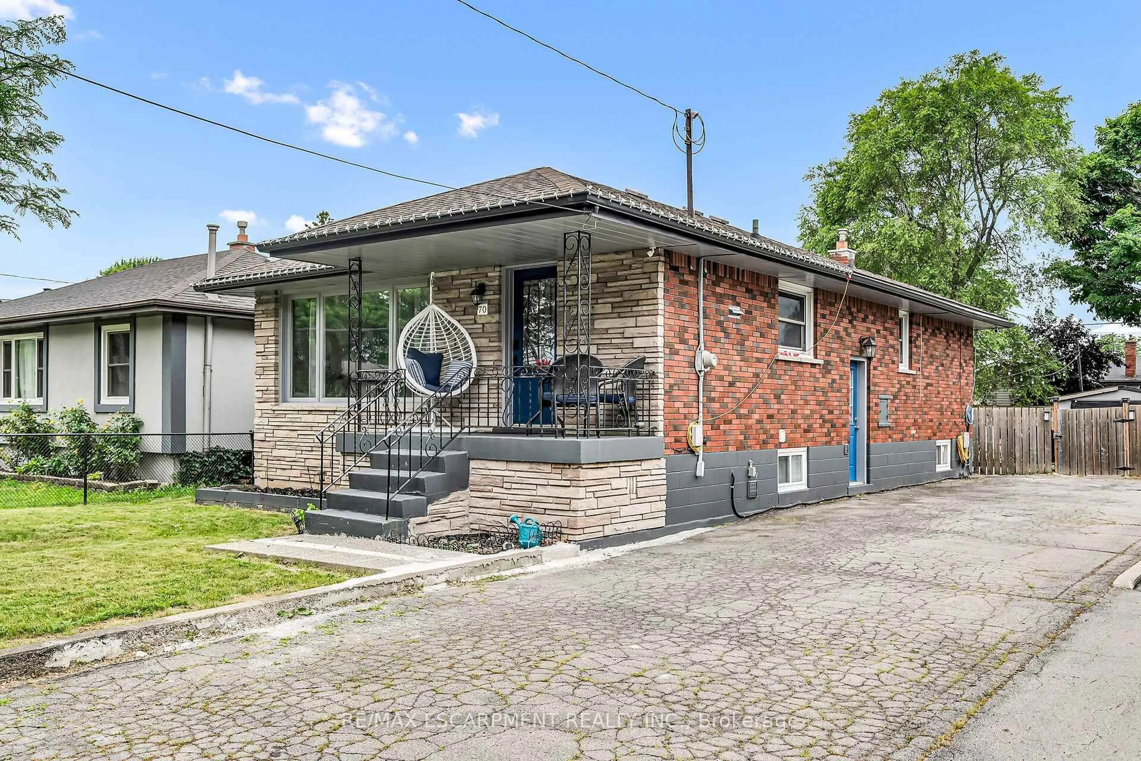 Home with brick exterior material, street for 70 Deschene Ave, Hamilton Ontario L9A 3J7