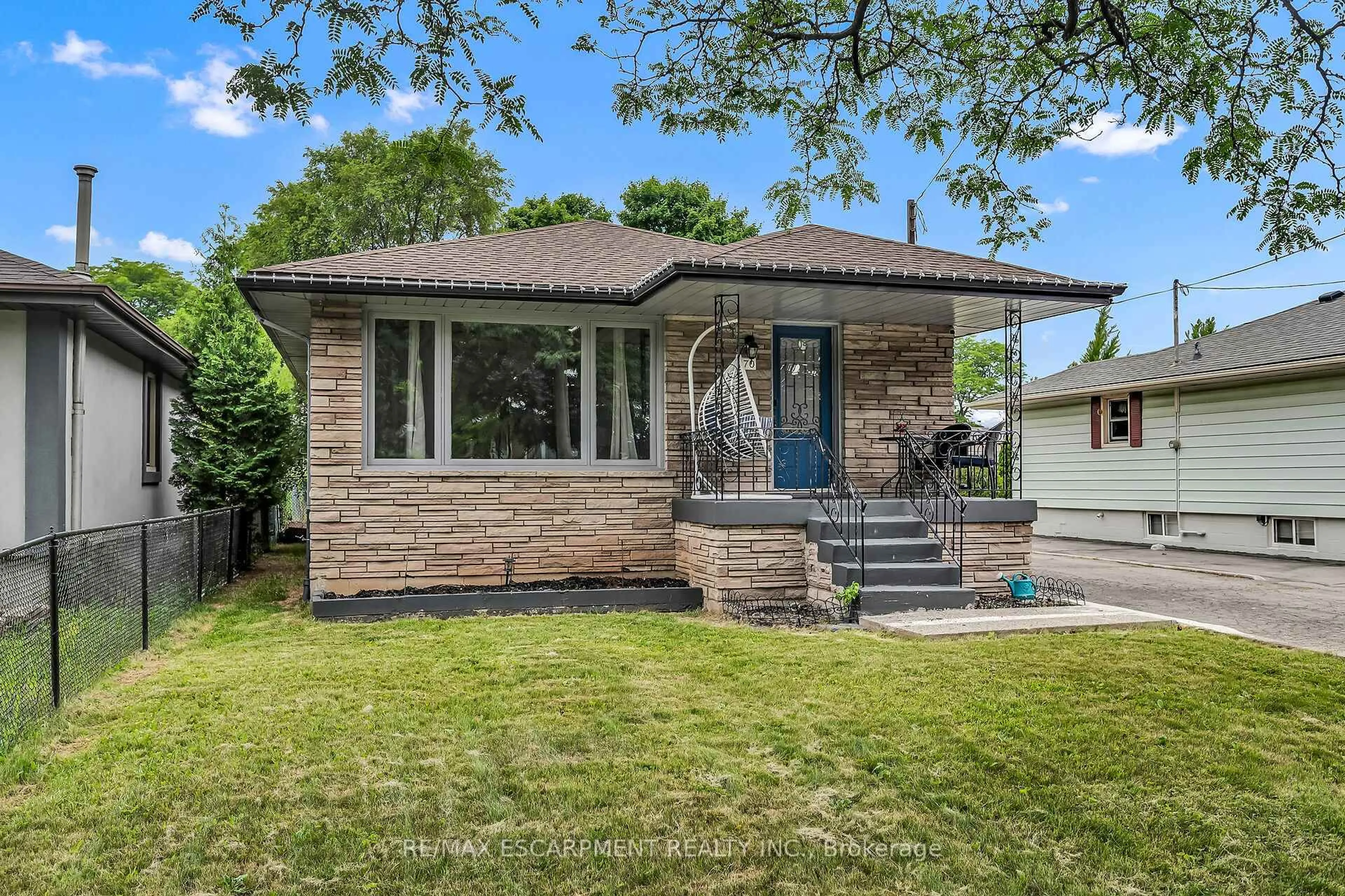 Home with brick exterior material, street for 70 Deschene Ave, Hamilton Ontario L9A 3J7