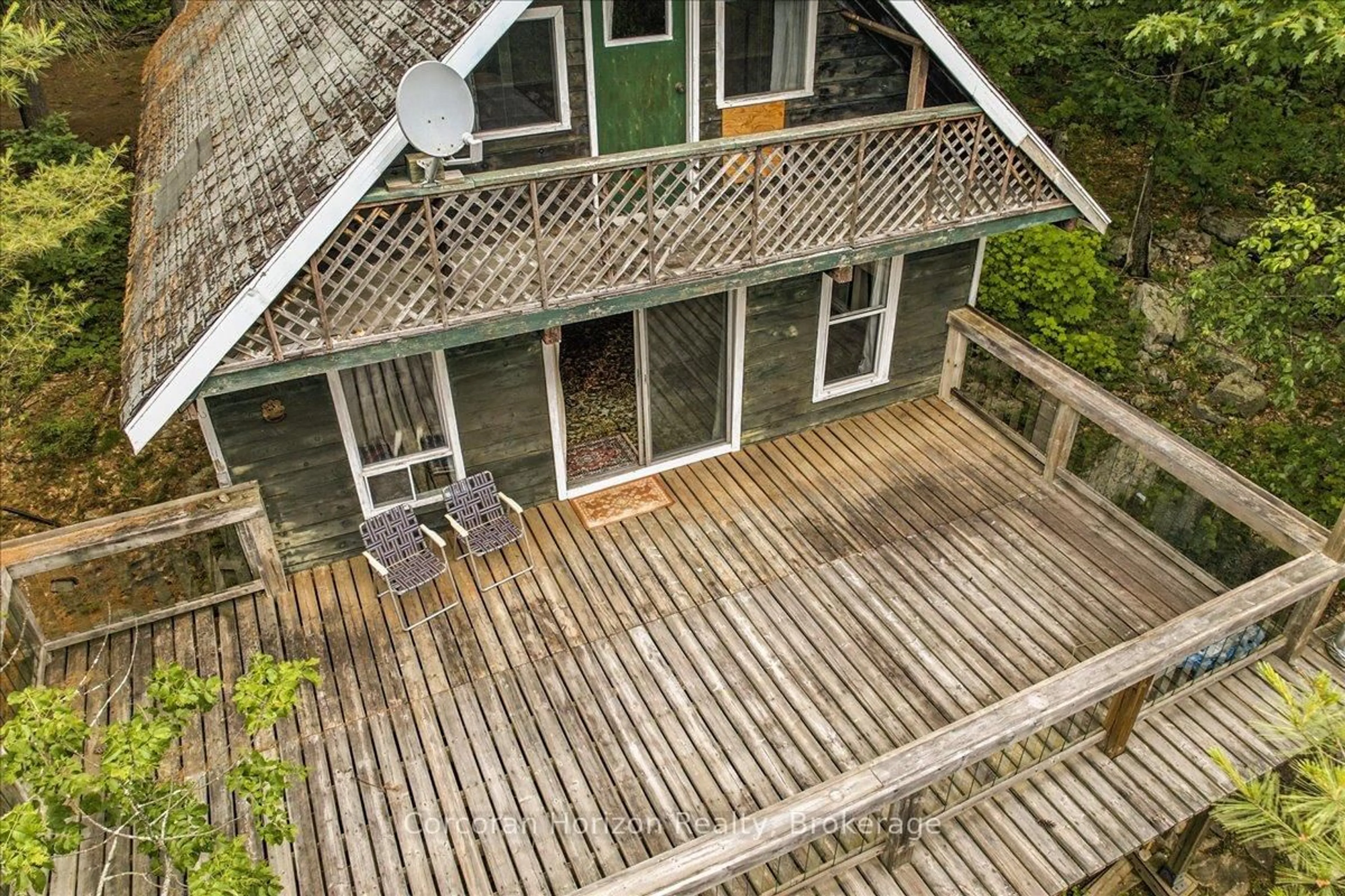 A pic from outside/outdoor area/front of a property/back of a property/a pic from drone, unknown for 78 Taylor Island, Gravenhurst Ontario P1P 1R2
