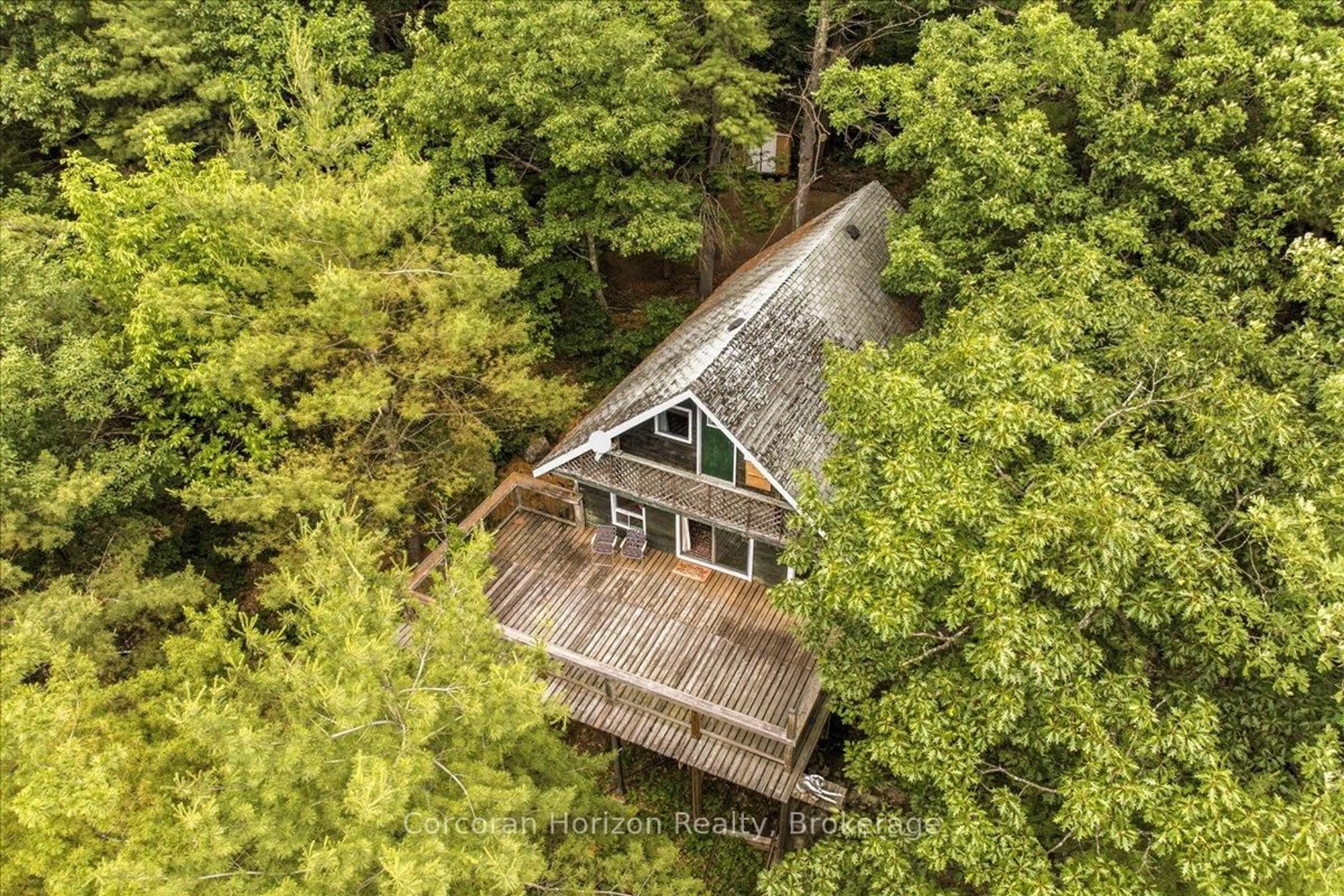 A pic from outside/outdoor area/front of a property/back of a property/a pic from drone, forest/trees view for 78 Taylor Island, Gravenhurst Ontario P1P 1R2