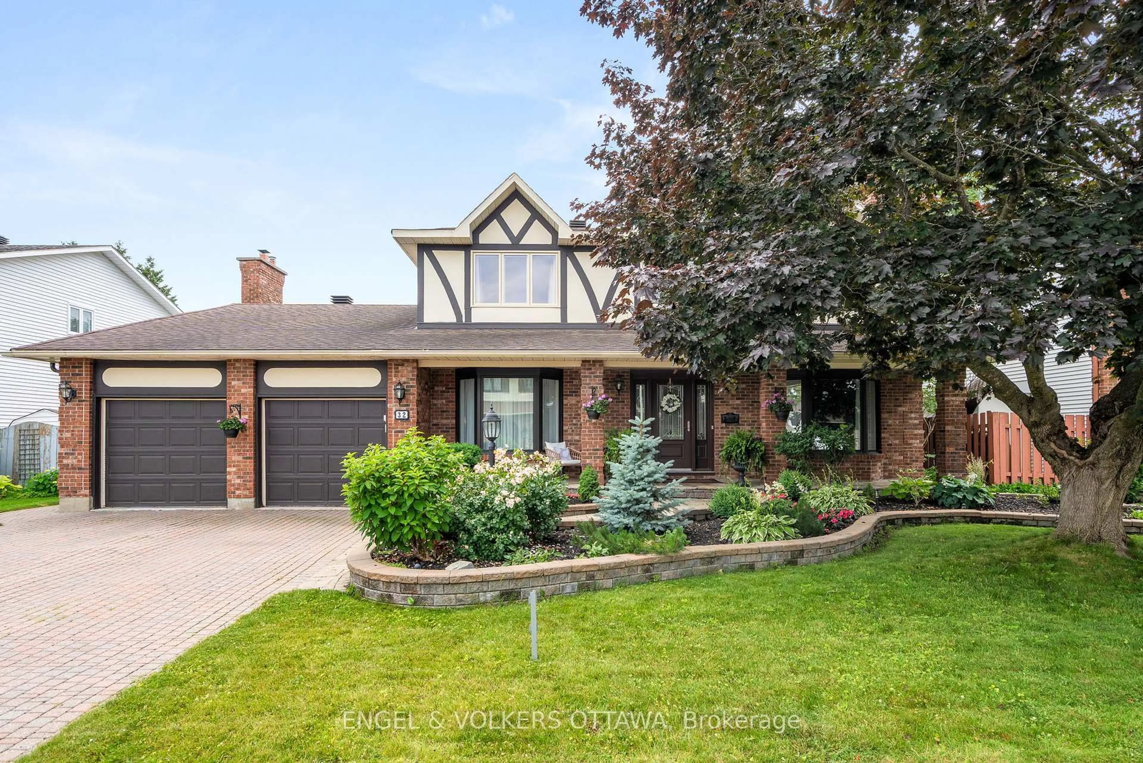 Home with brick exterior material, street for 32 Merkel Dr, Barrhaven Ontario K2J 1Z8