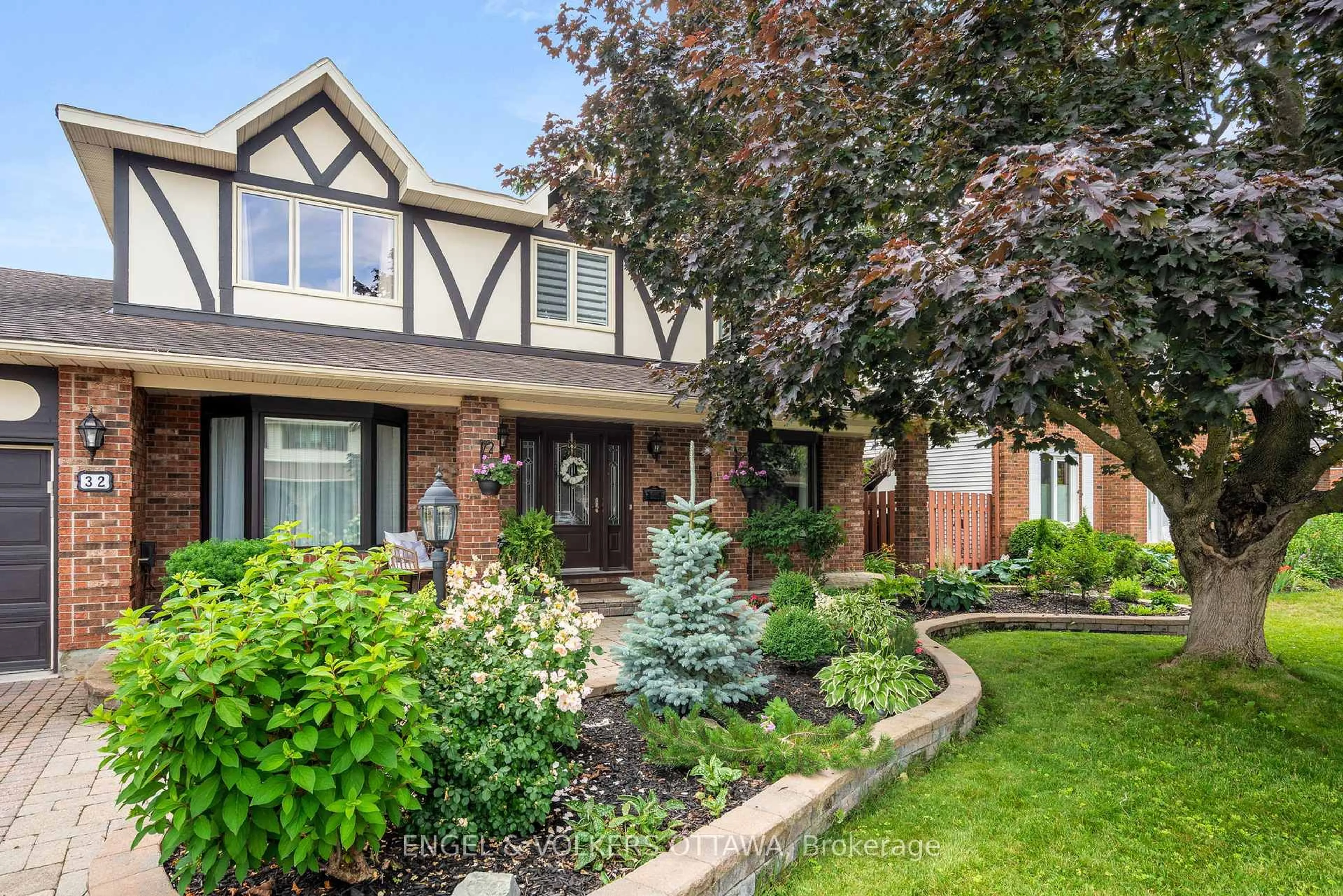 Home with brick exterior material, street for 32 Merkel Dr, Barrhaven Ontario K2J 1Z8
