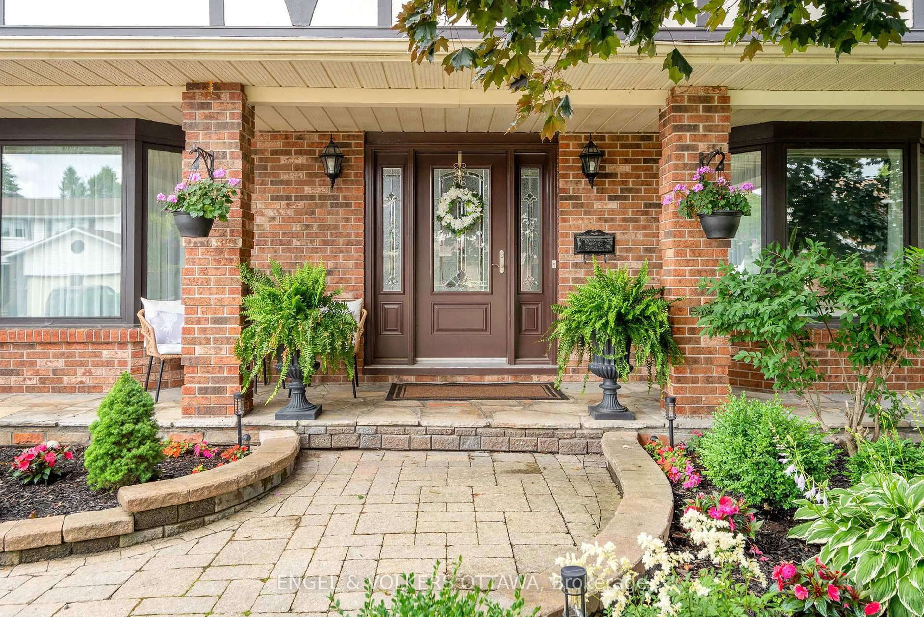 Home with brick exterior material, street for 32 Merkel Dr, Barrhaven Ontario K2J 1Z8