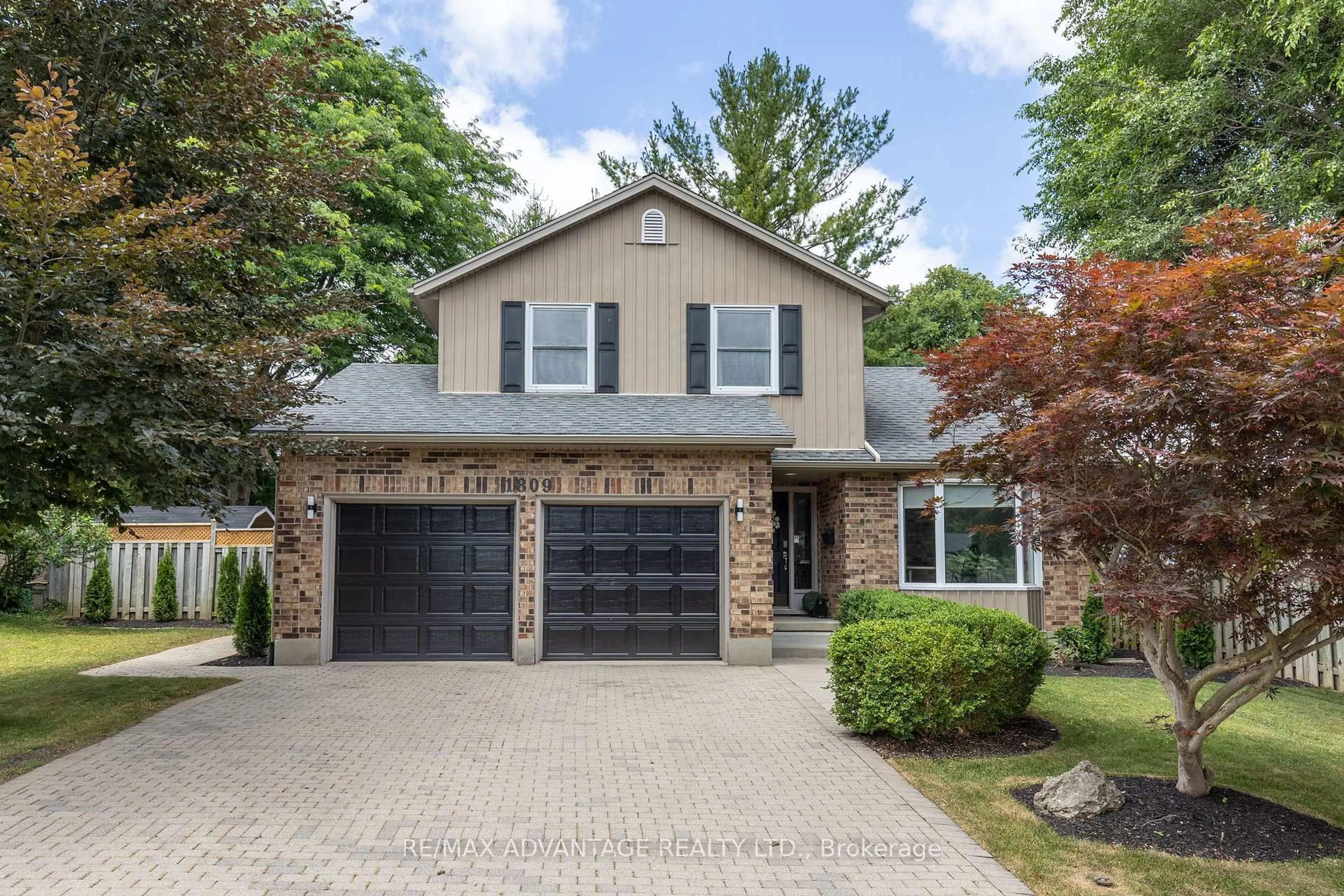 Home with brick exterior material, street for 1809 Phillbrook Dr, London North Ontario N5X 2Y2