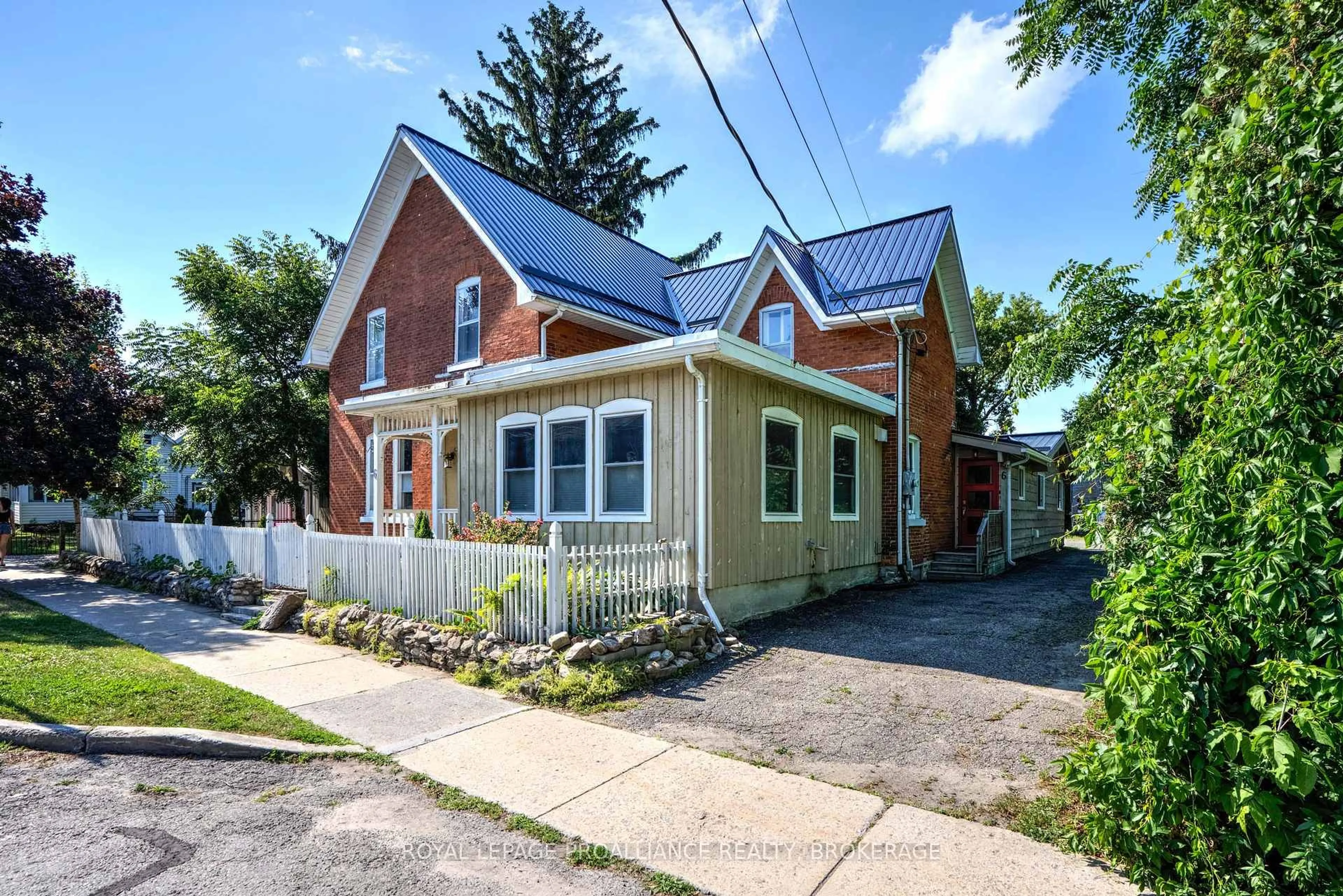 Home with brick exterior material, street for 6 Spring St, Westport Ontario K0G 1X0