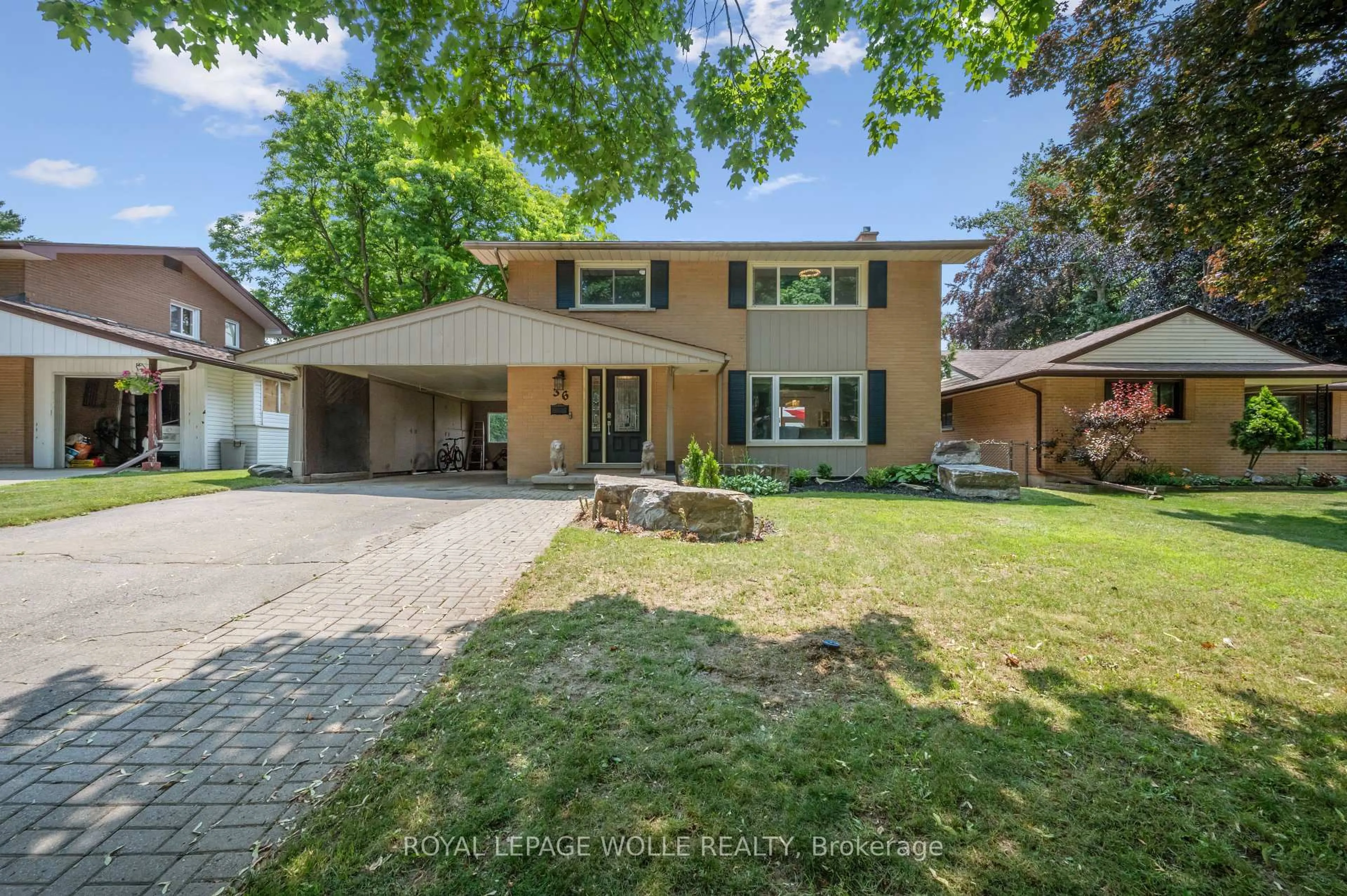 Home with brick exterior material, street for 36 Craig Dr, Kitchener Ontario N2B 2J3