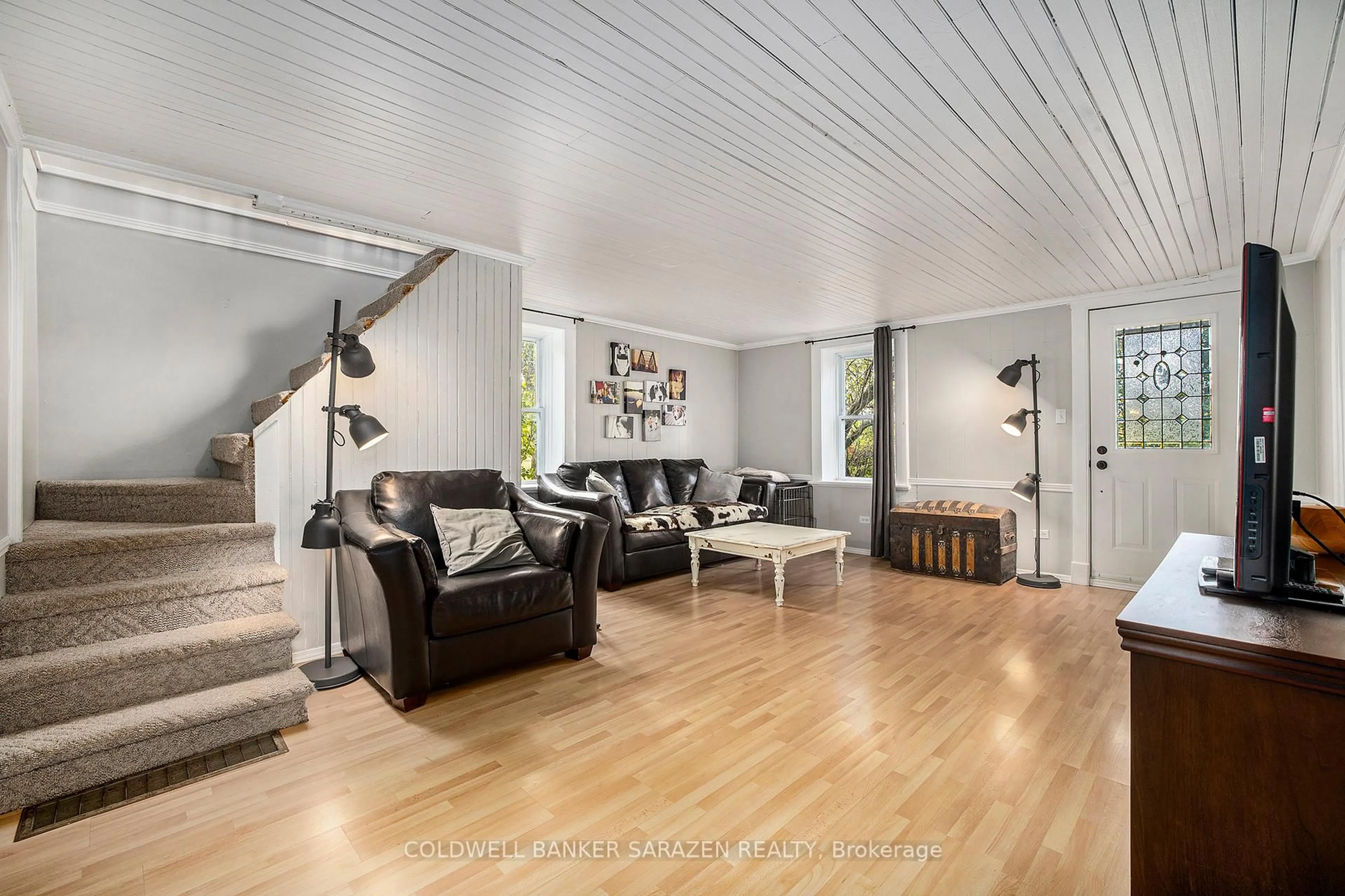 Living room with furniture, wood/laminate floor for 2030 Burnstown Rd, Renfrew Ontario K7V 3Z4