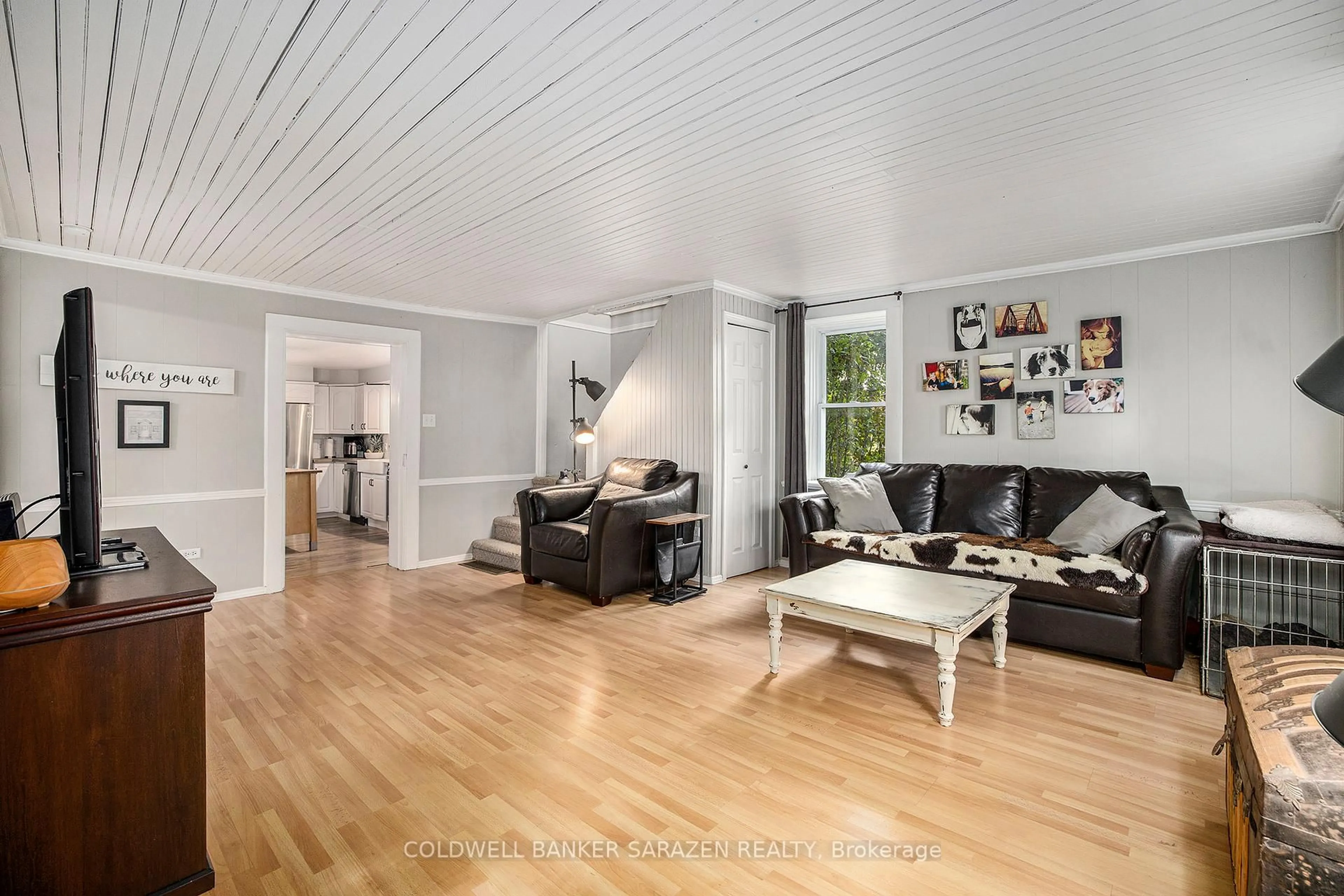 Living room with furniture, wood/laminate floor for 2030 Burnstown Rd, Renfrew Ontario K7V 3Z4