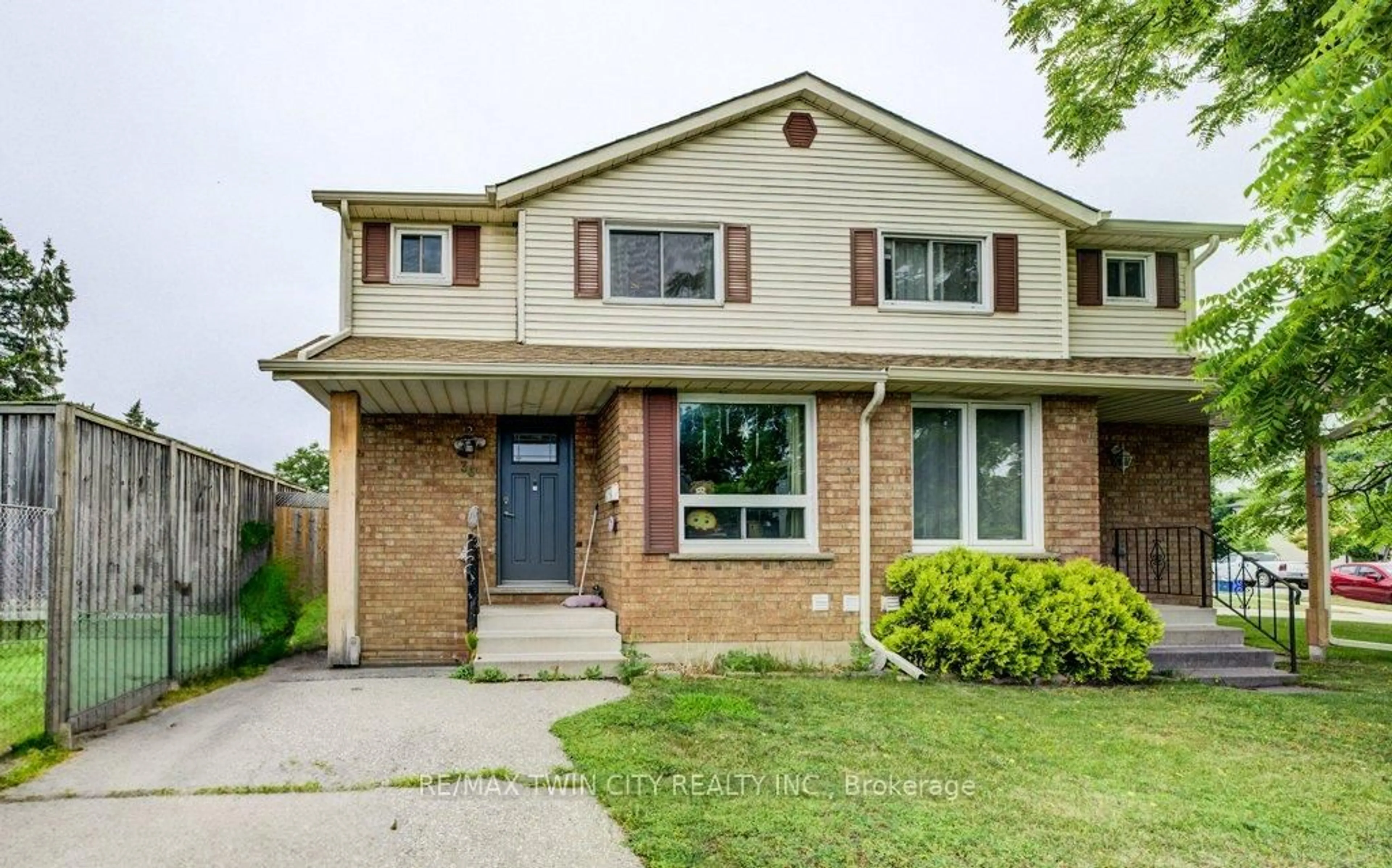 Home with brick exterior material, street for 30 Jansen Ave, Kitchener Ontario N2A 2L3