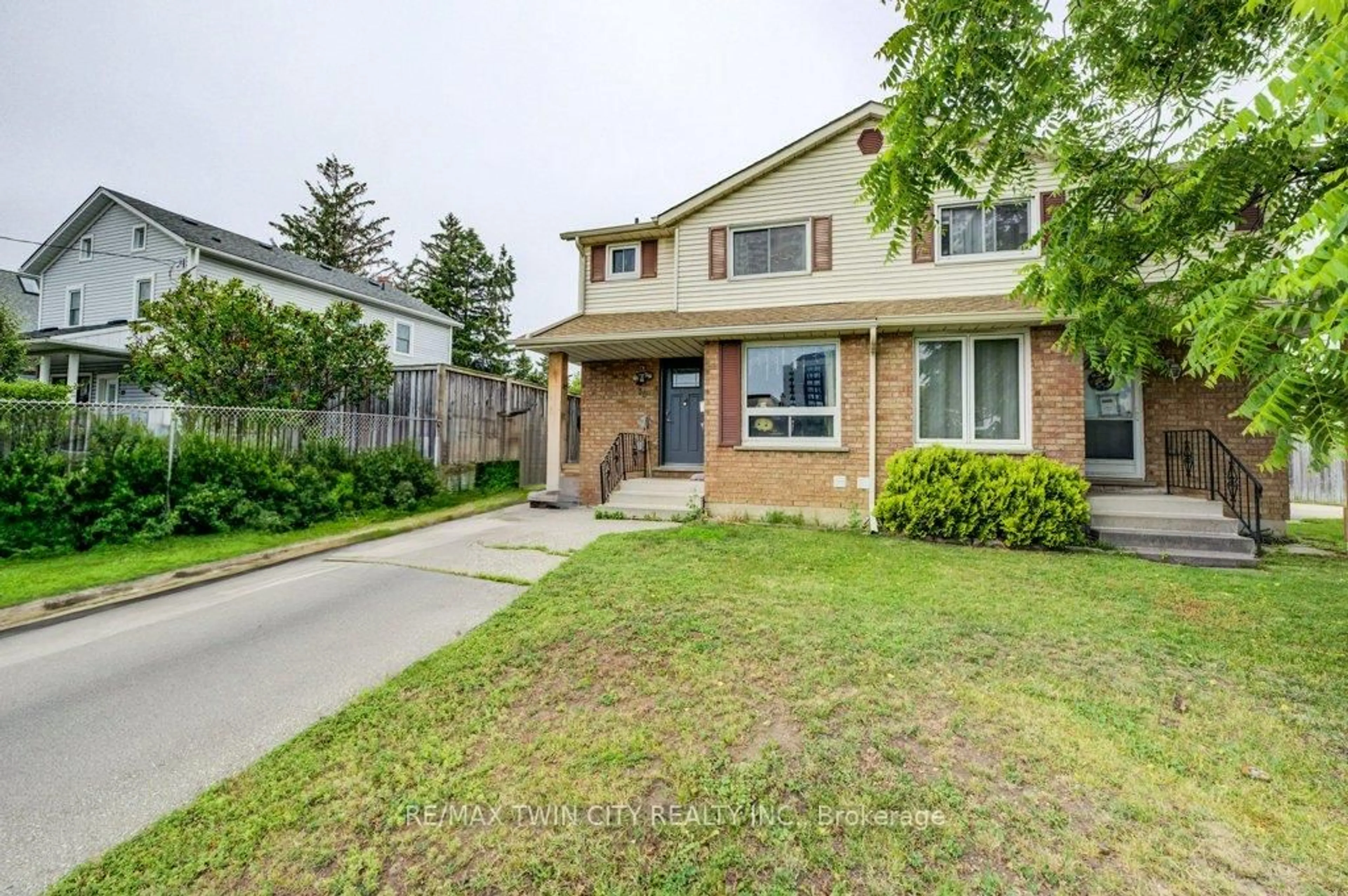 Home with brick exterior material, street for 30 Jansen Ave, Kitchener Ontario N2A 2L3