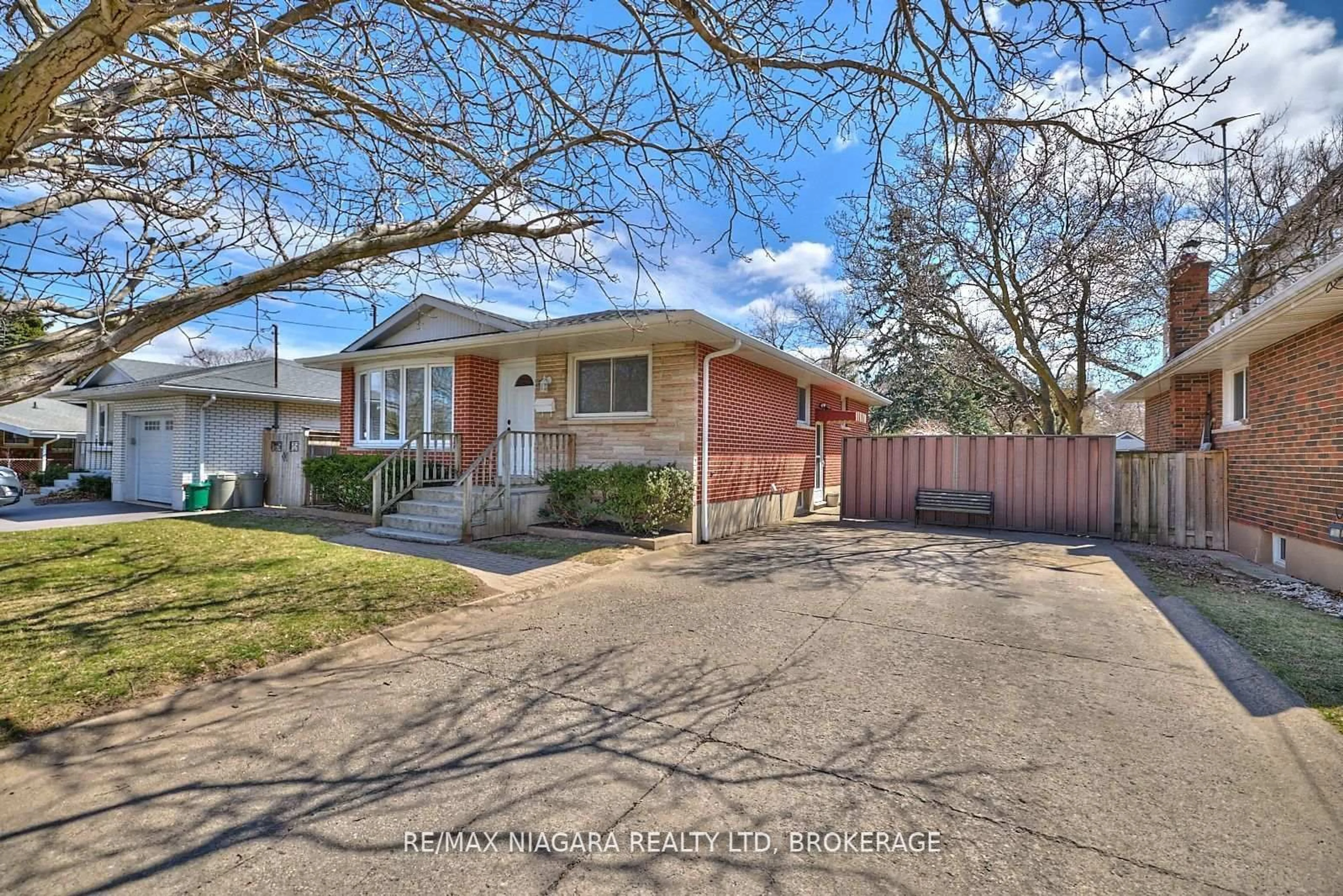 Home with brick exterior material, street for 8 Densgrove Dr, St. Catharines Ontario L2M 3M2