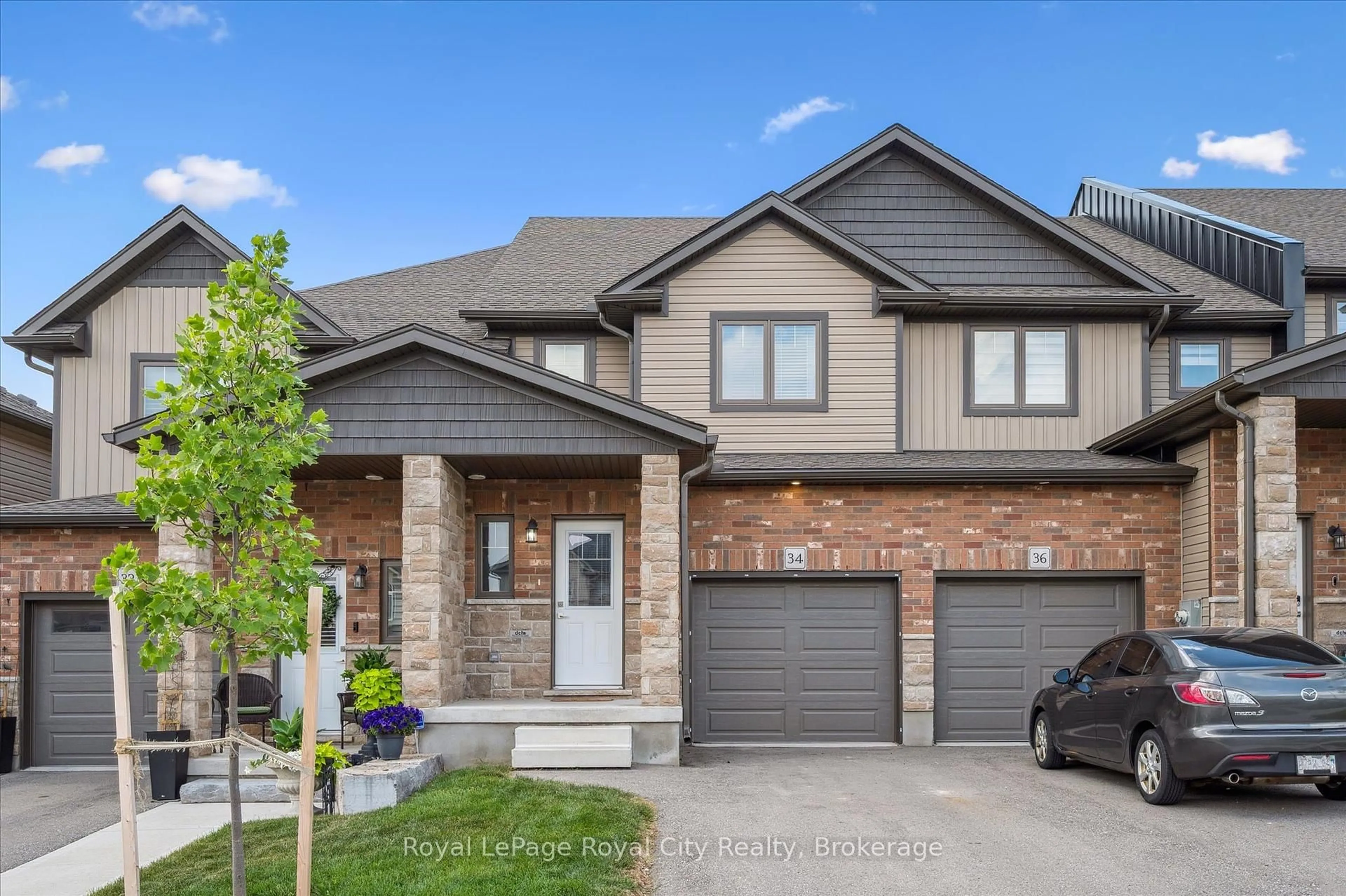 Home with brick exterior material, street for 34 Wideman Blvd, Guelph Ontario N1E 7L8