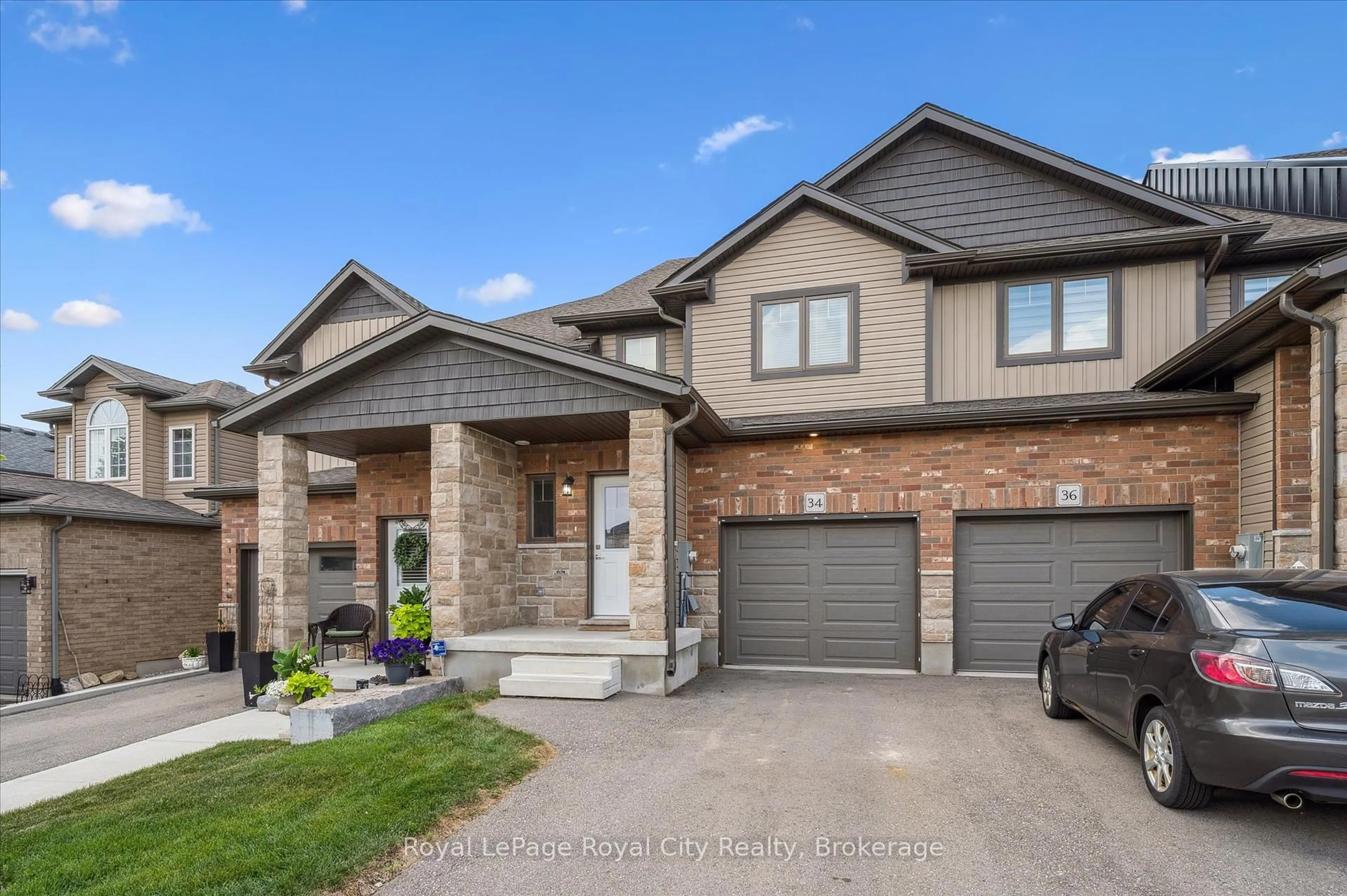 Home with brick exterior material, street for 34 Wideman Blvd, Guelph Ontario N1E 7L8