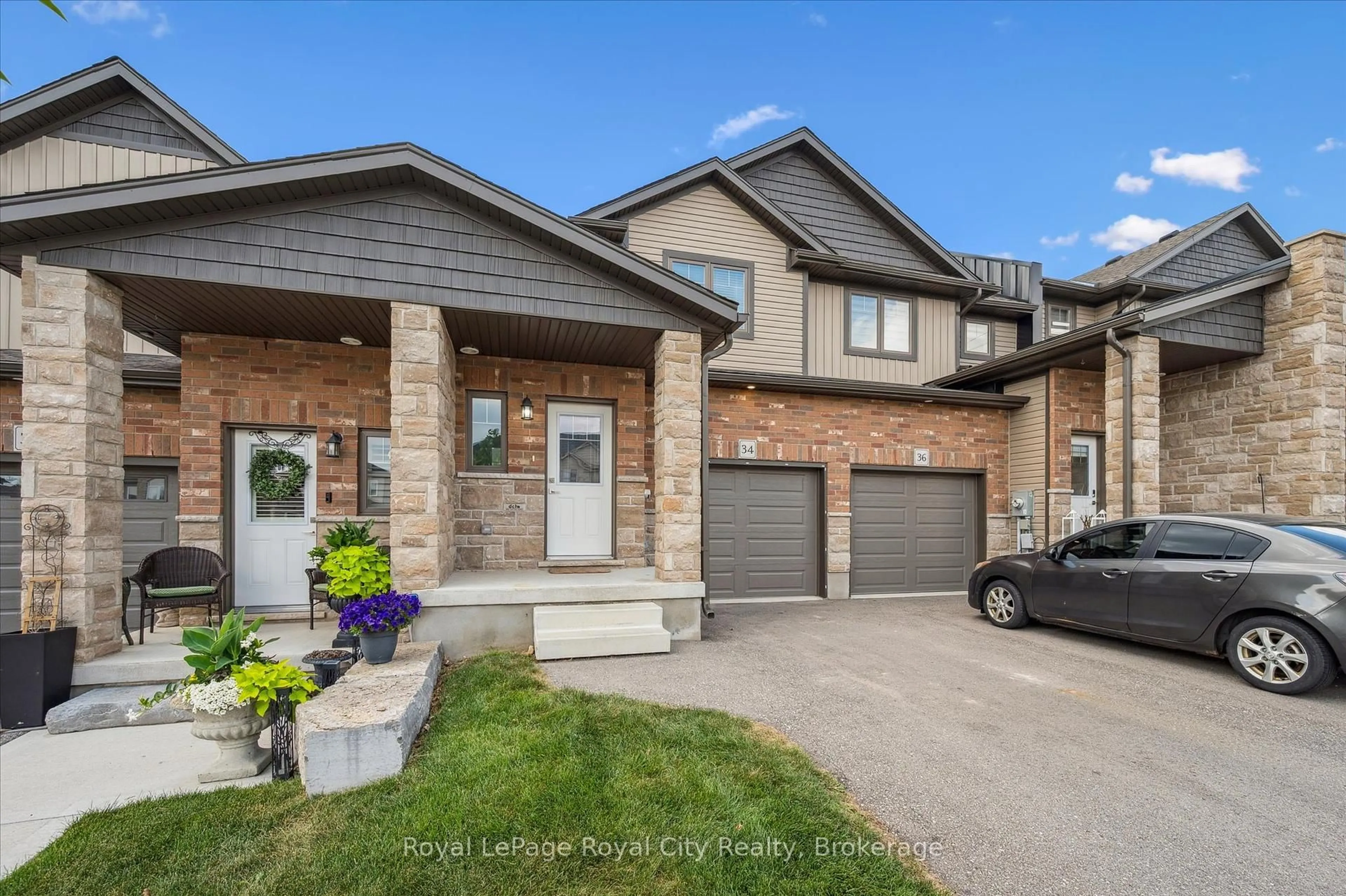 Home with brick exterior material, street for 34 Wideman Blvd, Guelph Ontario N1E 7L8