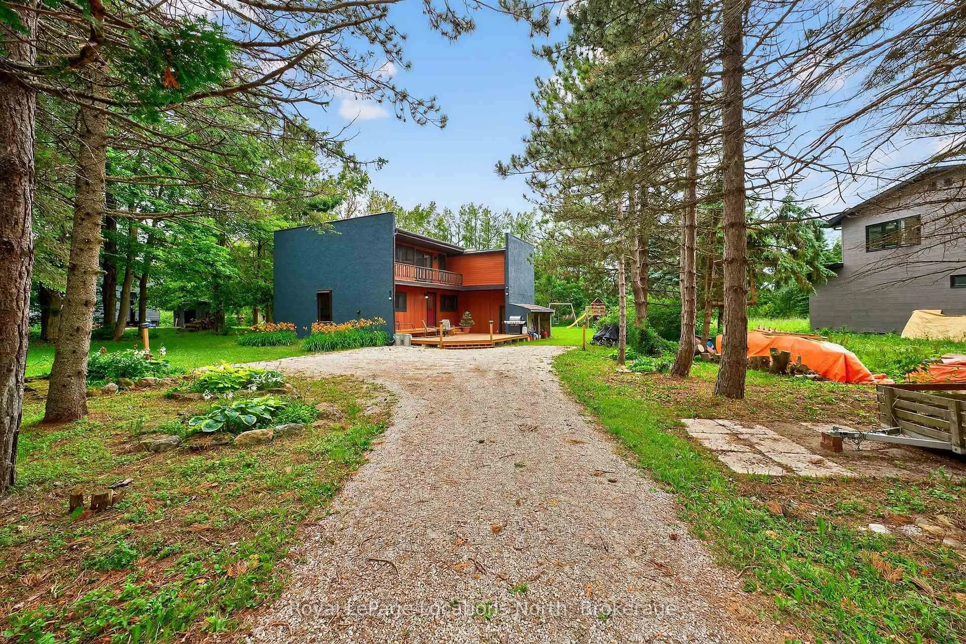 A pic from outside/outdoor area/front of a property/back of a property/a pic from drone, forest/trees view for 119 TYROL Ave, Blue Mountains Ontario N0H 2E0