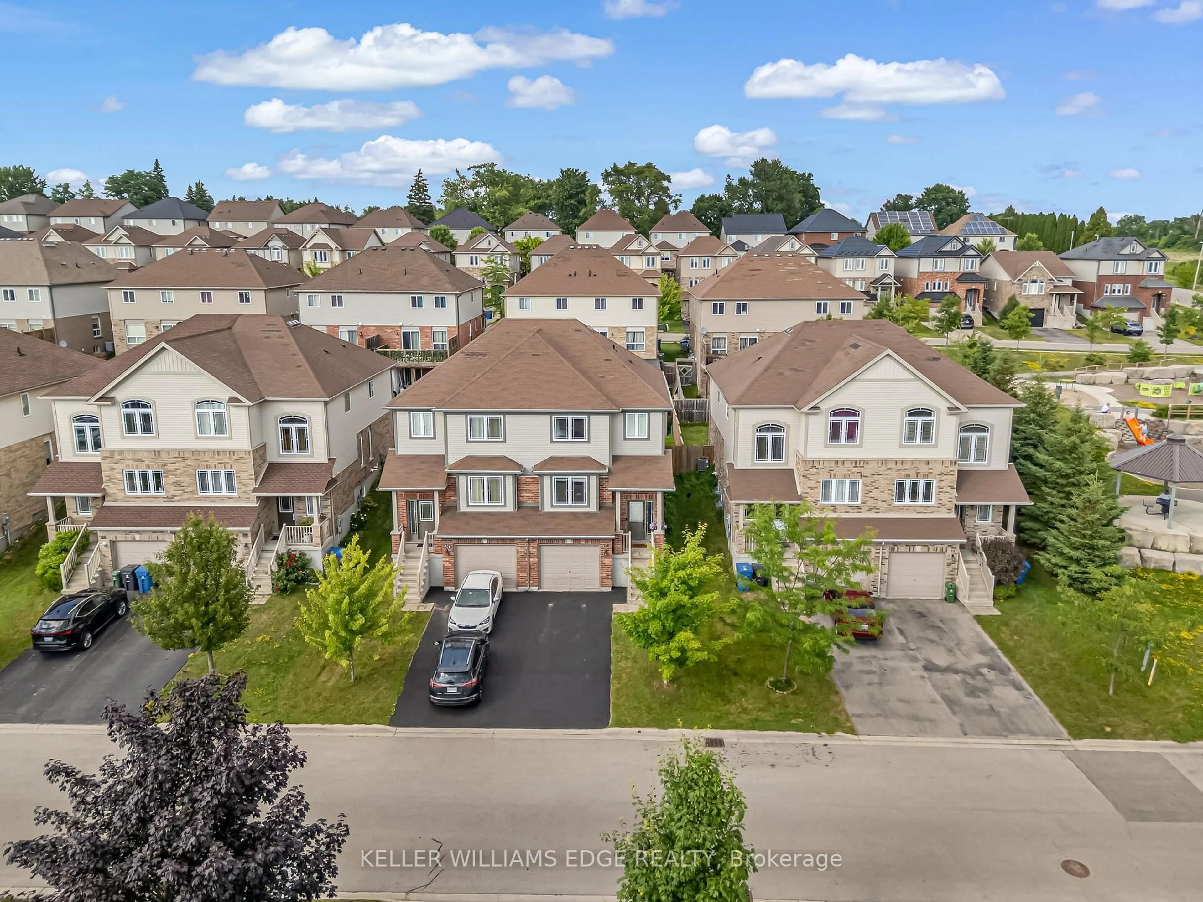 A pic from outside/outdoor area/front of a property/back of a property/a pic from drone, street for 19 Oakes Cres, Guelph Ontario N1E 0J6