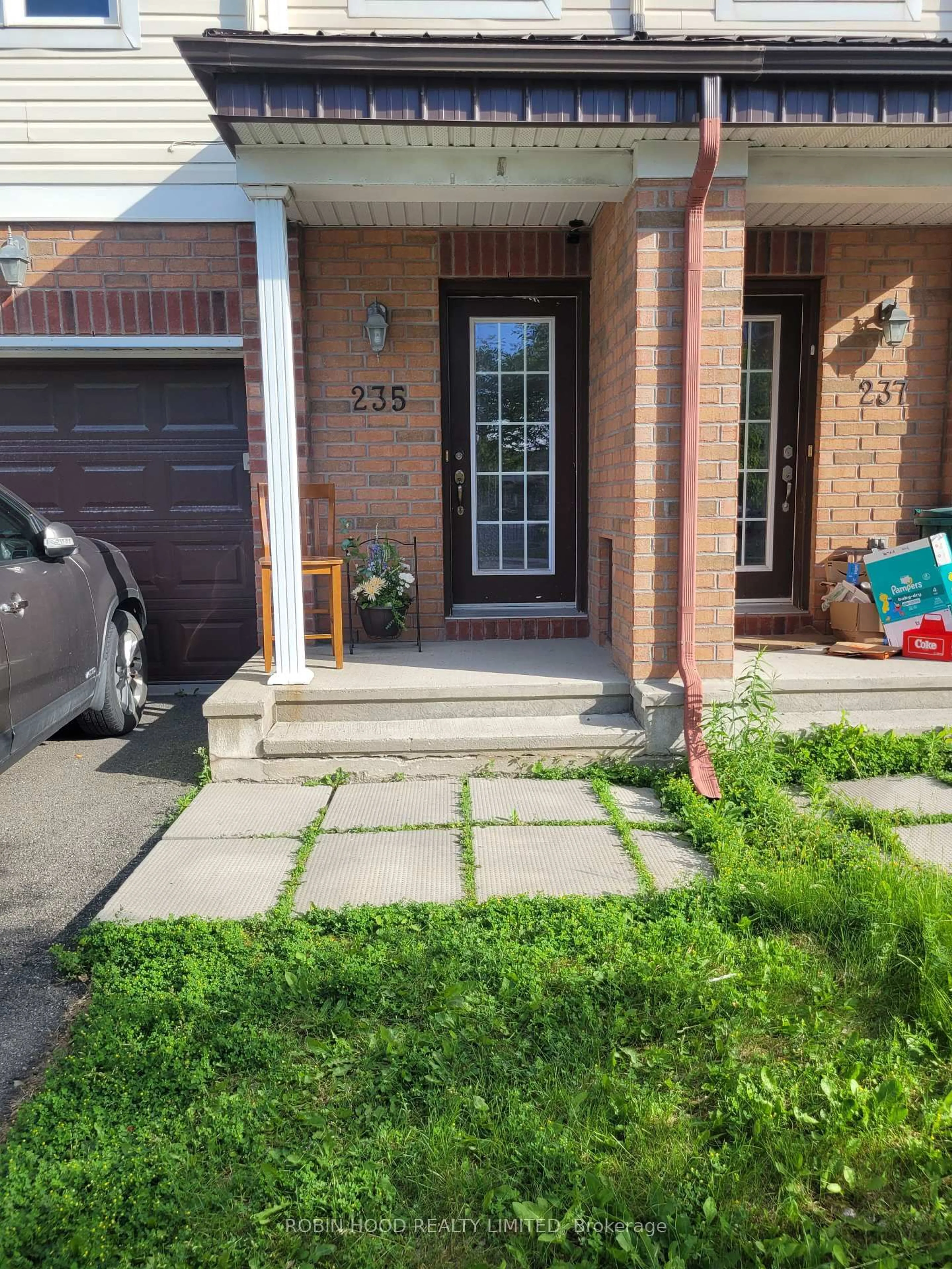 Home with brick exterior material, street for 235 Kennevale Dr, Ottawa Ontario K2J 0C3