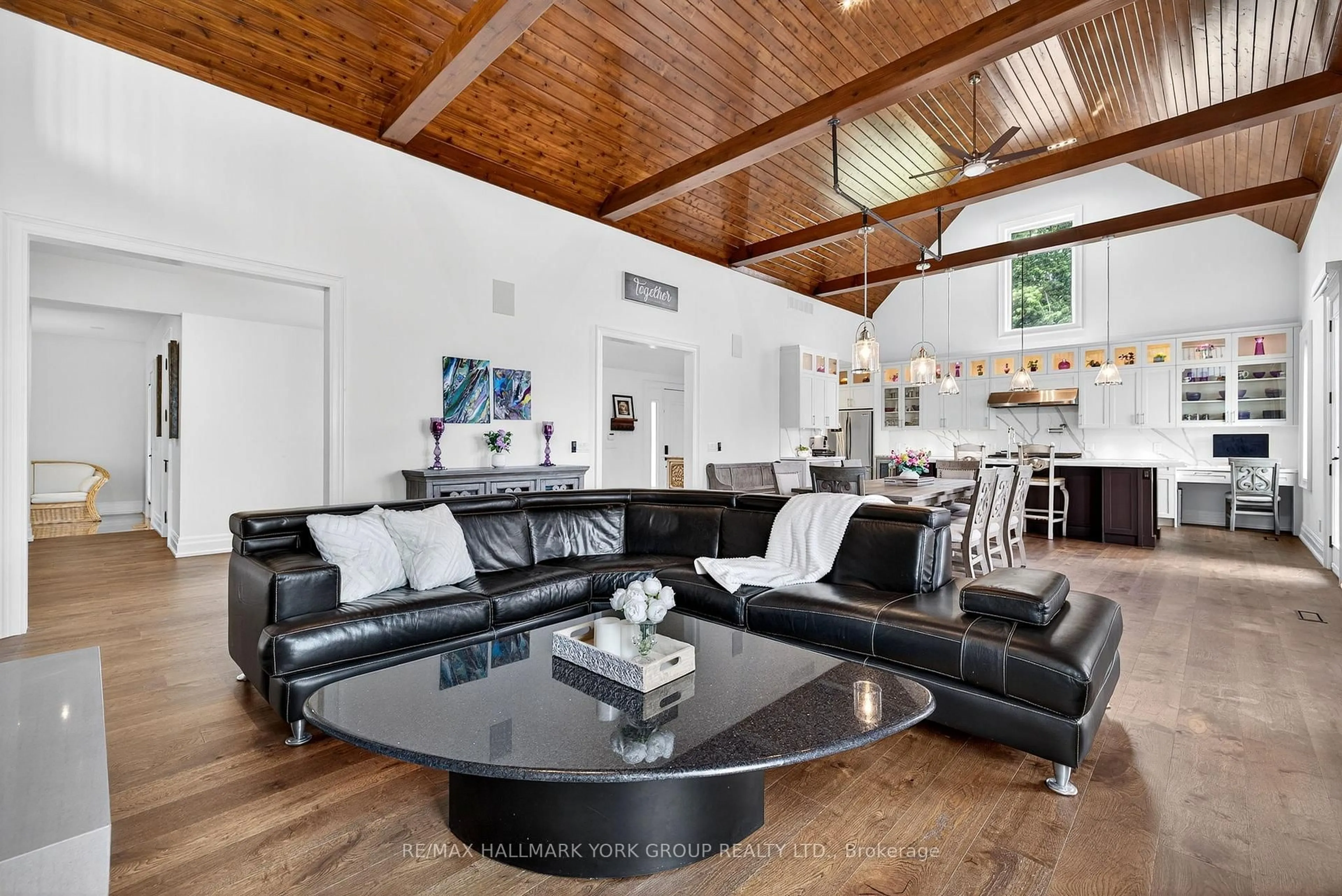 Living room with furniture, wood/laminate floor for 10 Grills Rd, Kawartha Lakes Ontario K0M 2C0