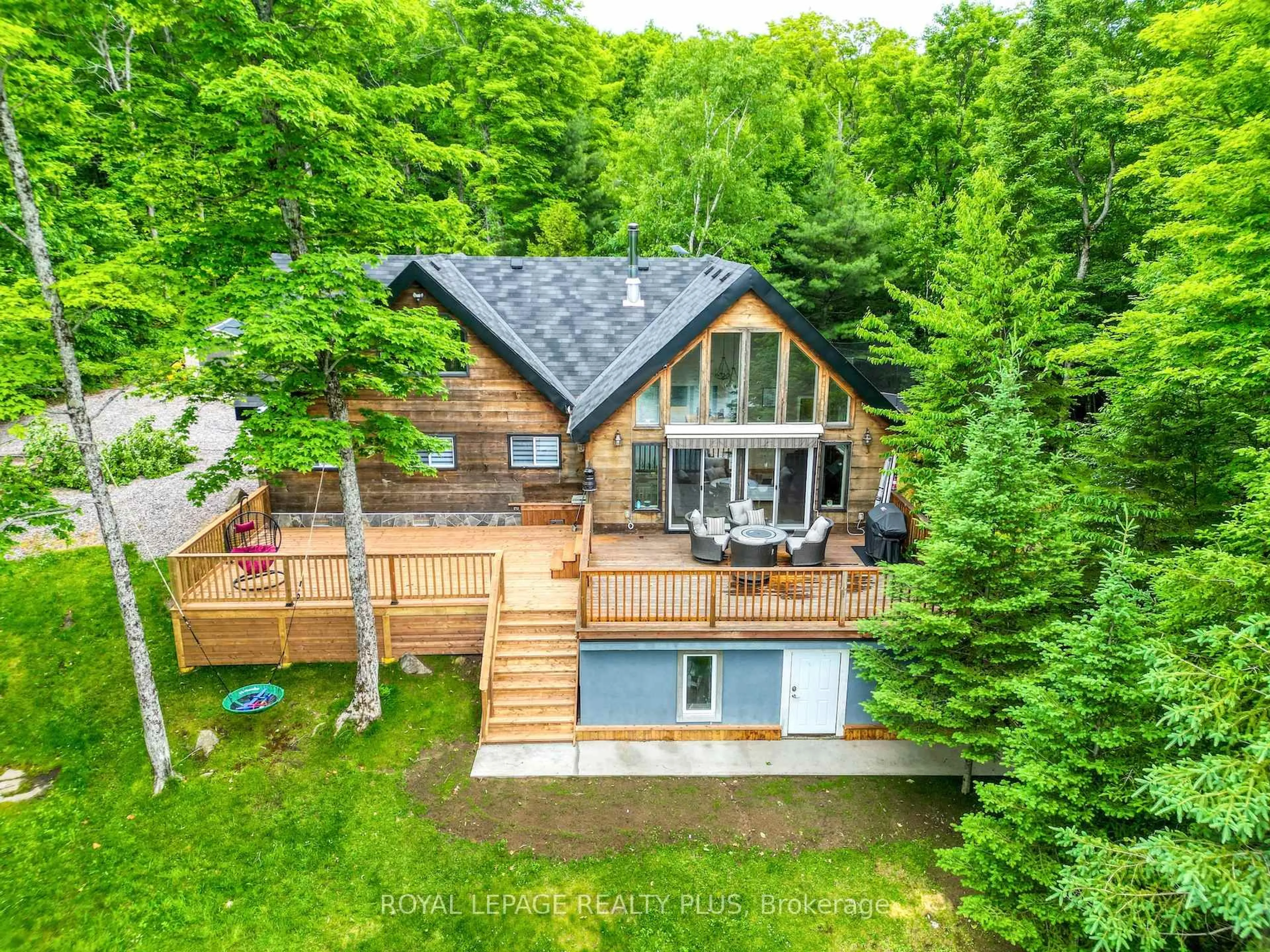 A pic from outside/outdoor area/front of a property/back of a property/a pic from drone, water/lake/river/ocean view for 10 Moose Lane, Whitestone Ontario P0A 1G0