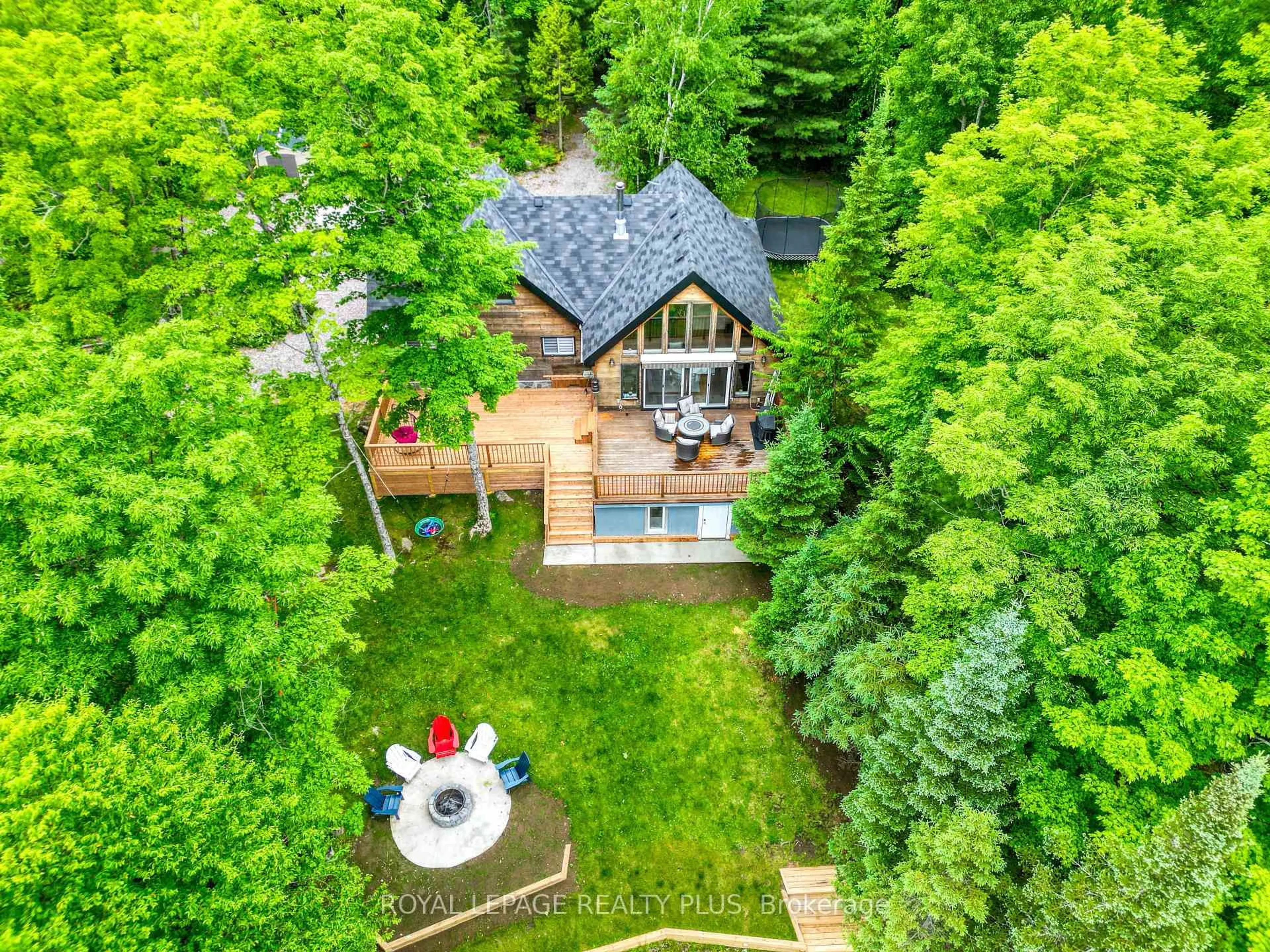 A pic from outside/outdoor area/front of a property/back of a property/a pic from drone, forest/trees view for 10 Moose Lane, Whitestone Ontario P0A 1G0