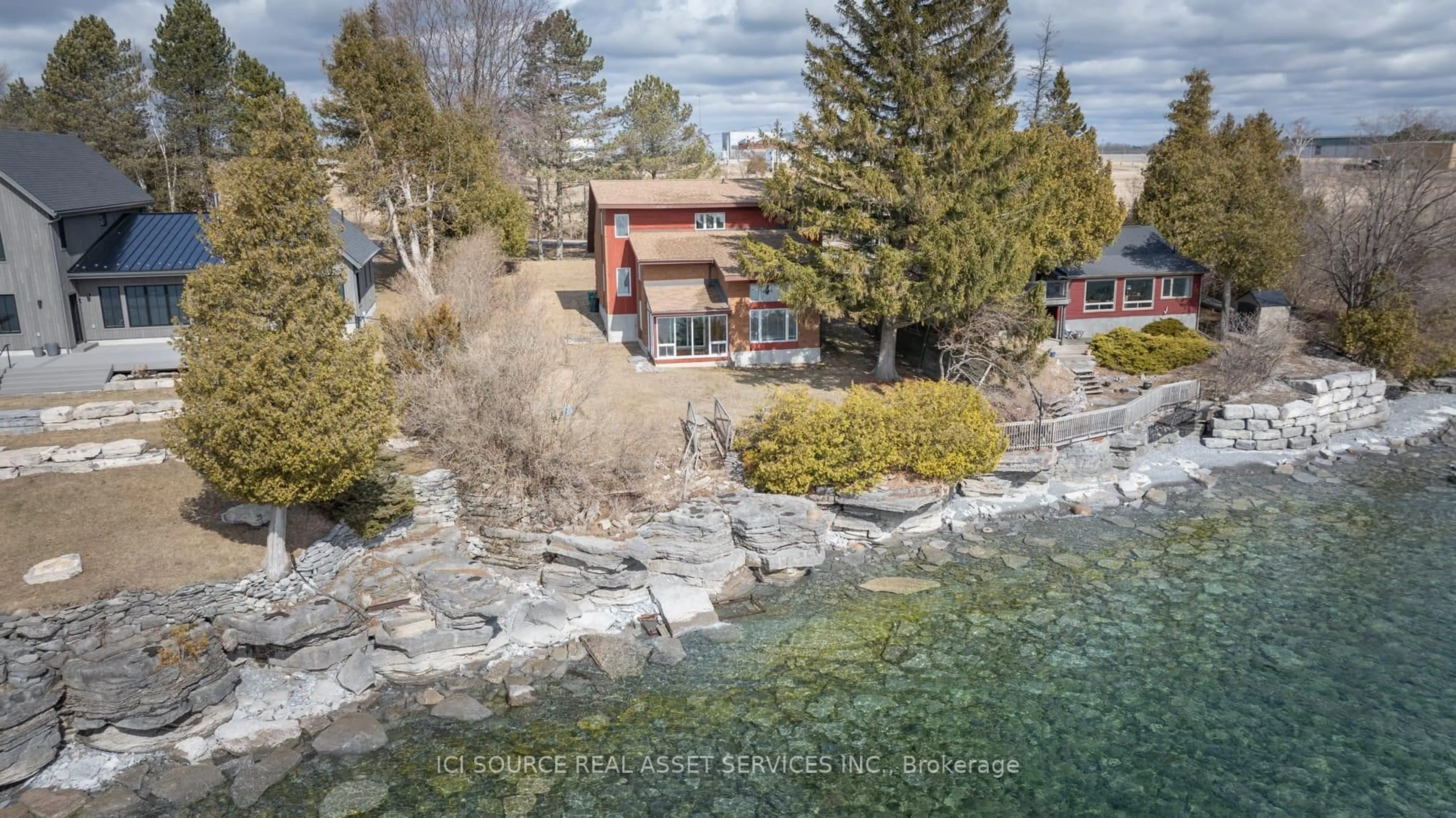 A pic from outside/outdoor area/front of a property/back of a property/a pic from drone, water/lake/river/ocean view for 1141 Front Rd, Kingston Ontario K7M 4M2