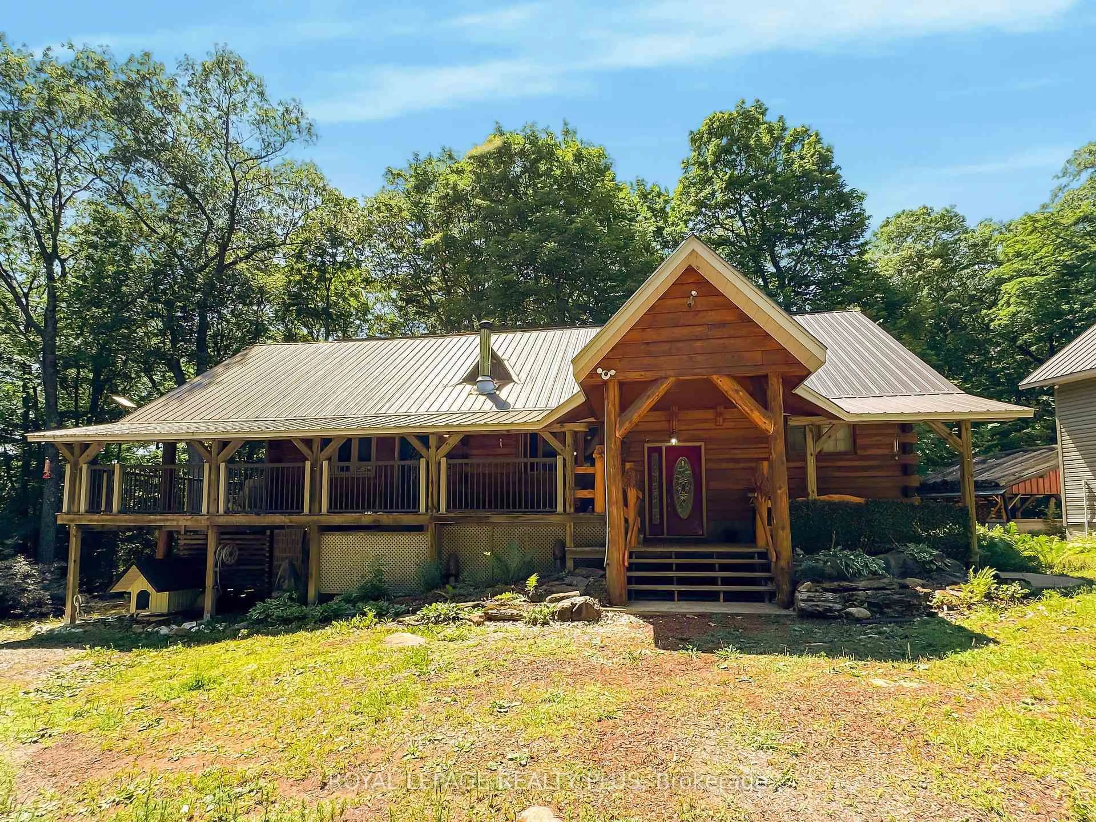 A pic from outside/outdoor area/front of a property/back of a property/a pic from drone, unknown for 203 Cottage Lane, Carlow/Mayo Ontario K0L 2M0