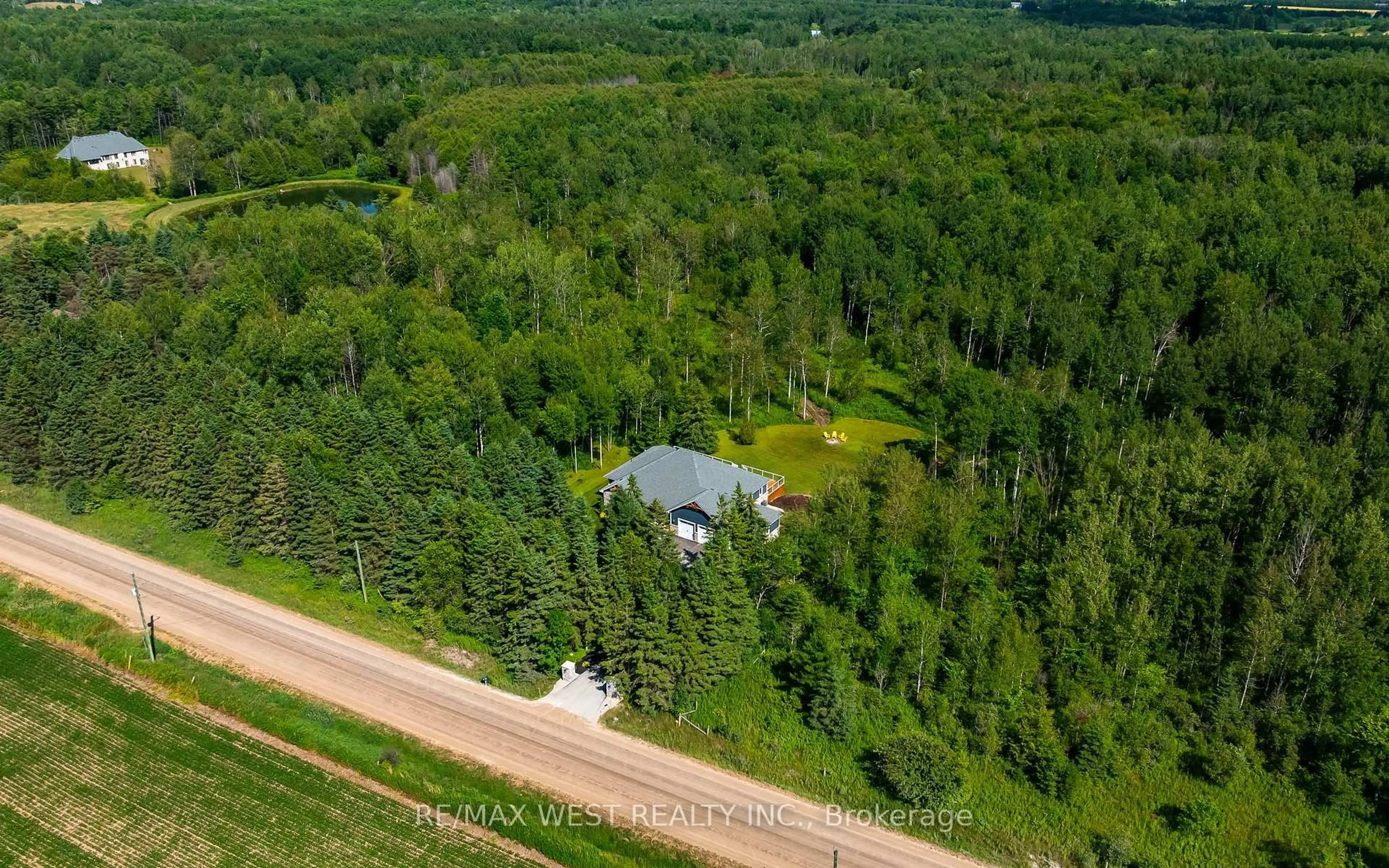 A pic from outside/outdoor area/front of a property/back of a property/a pic from drone, forest/trees view for 8769 Erin Garafraxa Town Line, Erin Ontario L0N 1N0