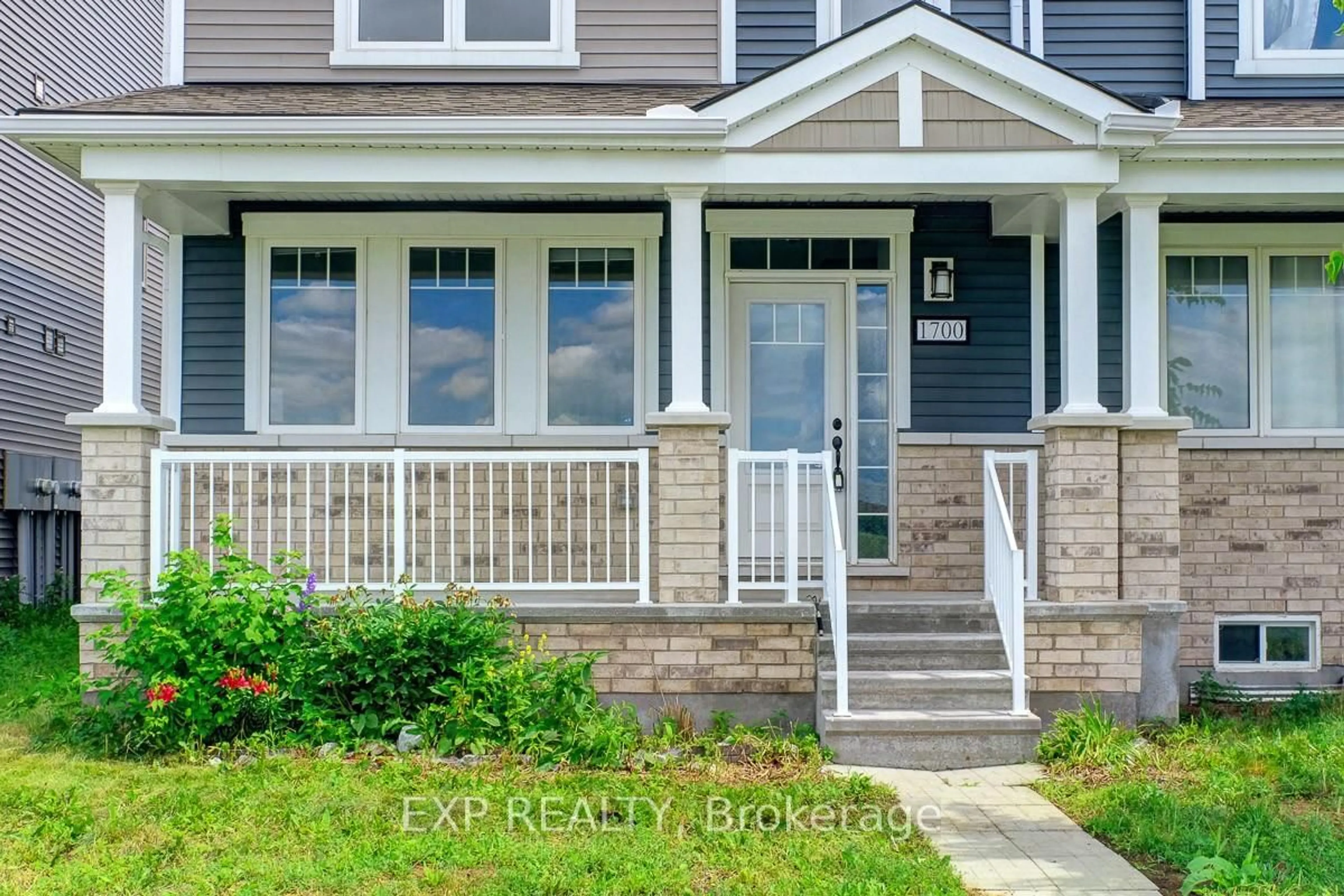 Home with vinyl exterior material, street for 1700 Maple Grove Rd, Stittsville Ontario K2S 2R3