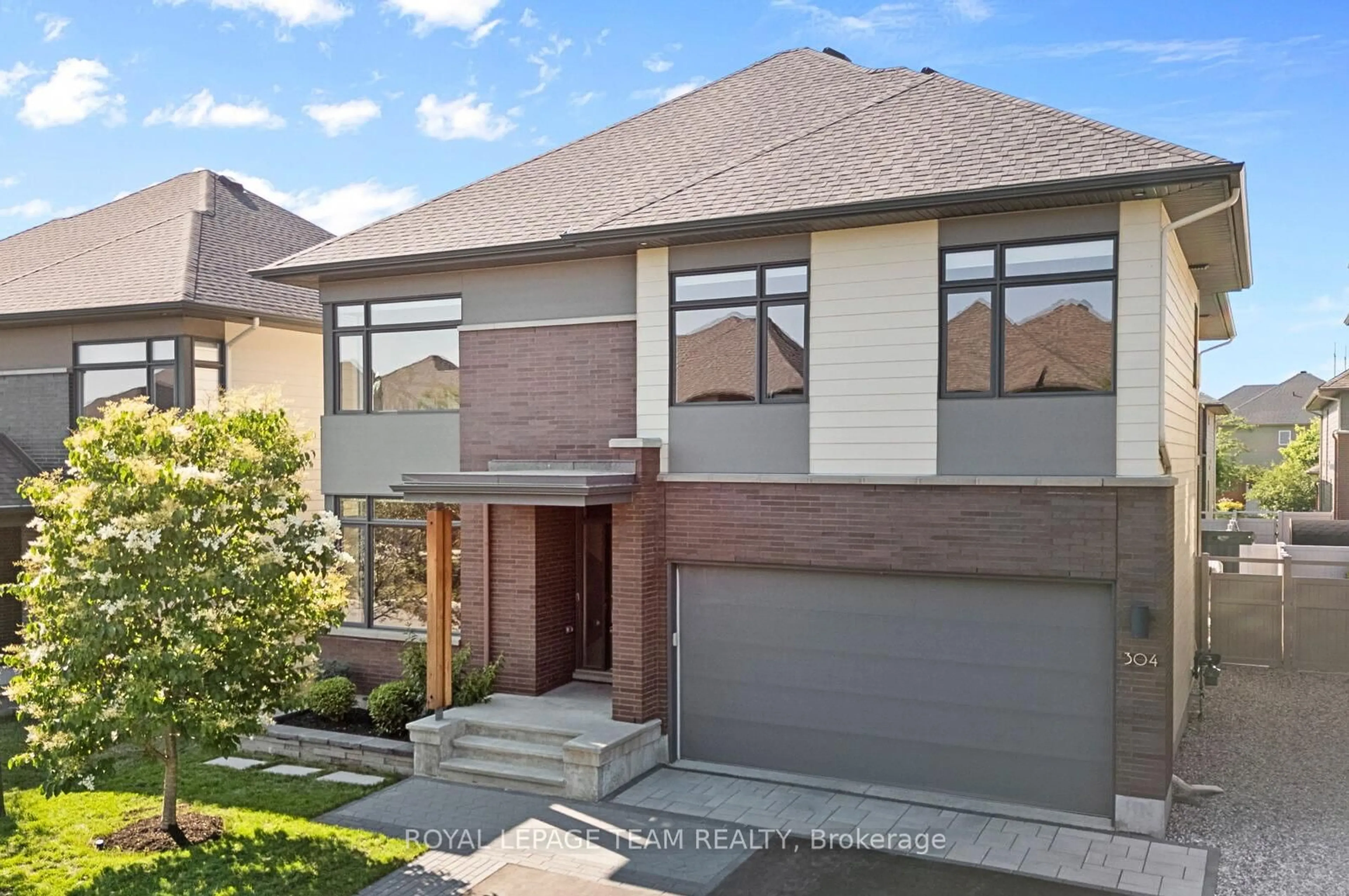 Home with brick exterior material, street for 304 Long Acres St, Ottawa Ontario K2M 0H1