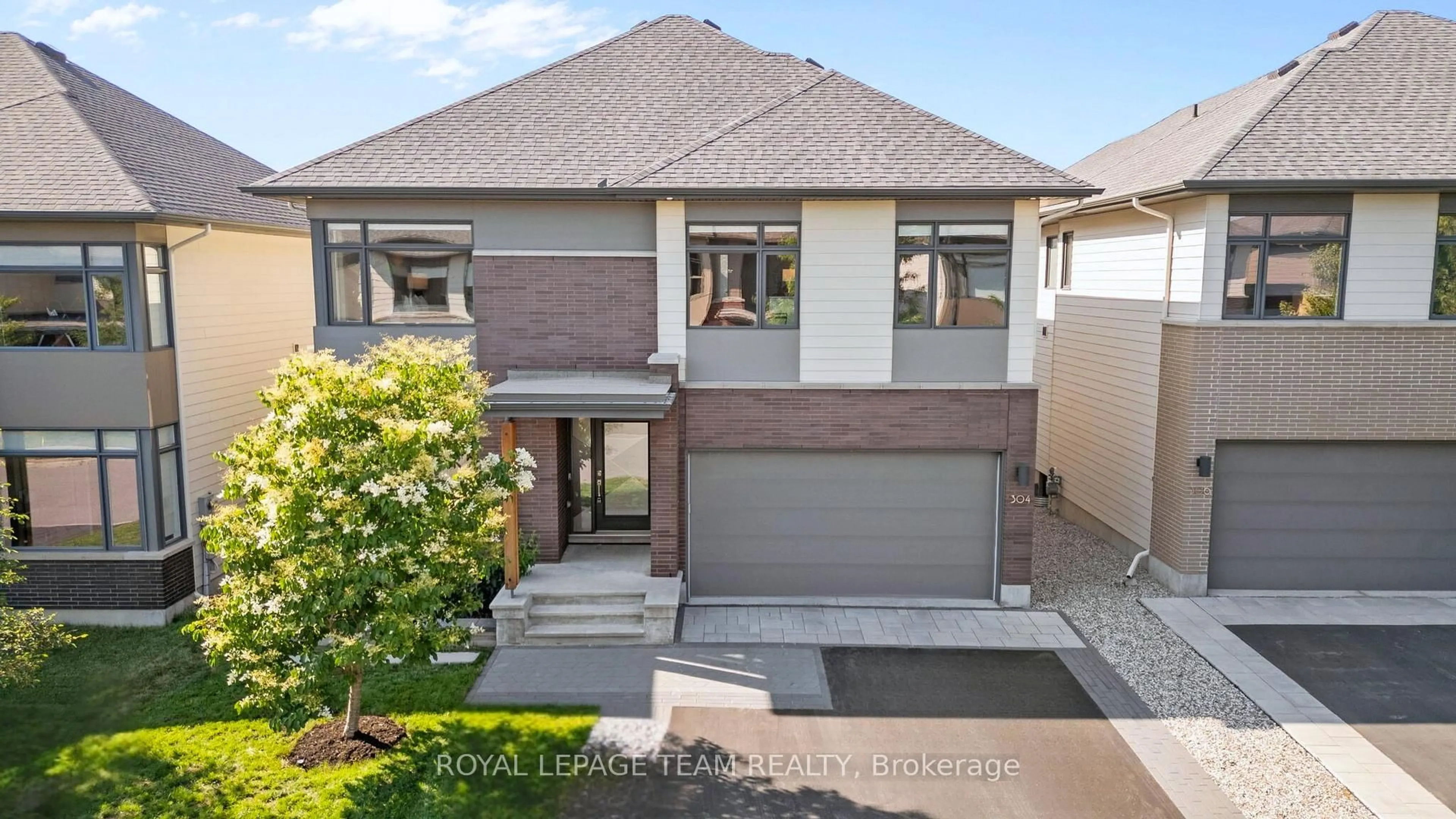 A pic from outside/outdoor area/front of a property/back of a property/a pic from drone, street for 304 Long Acres St, Ottawa Ontario K2M 0H1
