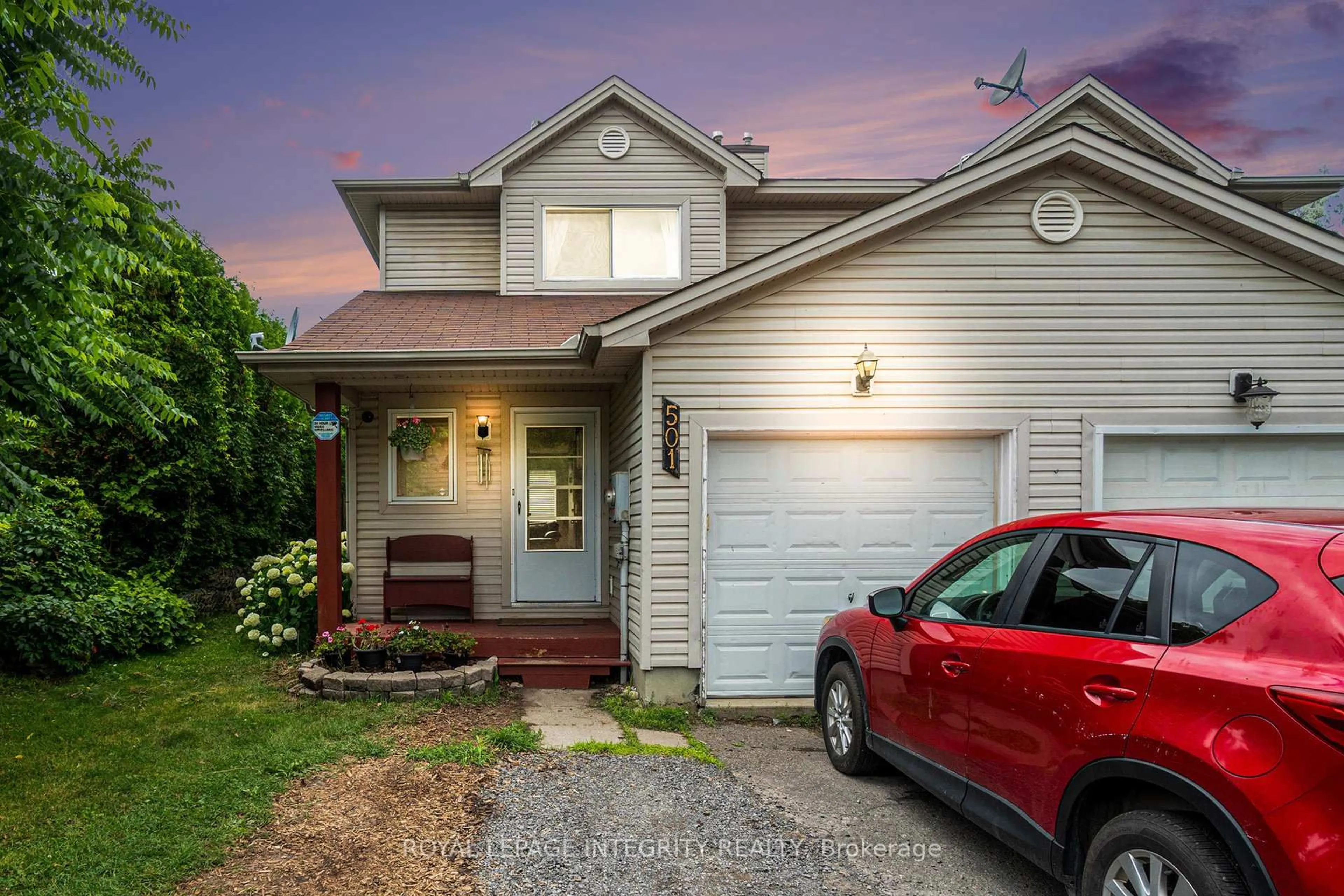 Home with vinyl exterior material, street for 501 Maley St, North Grenville Ontario K0G 1J0