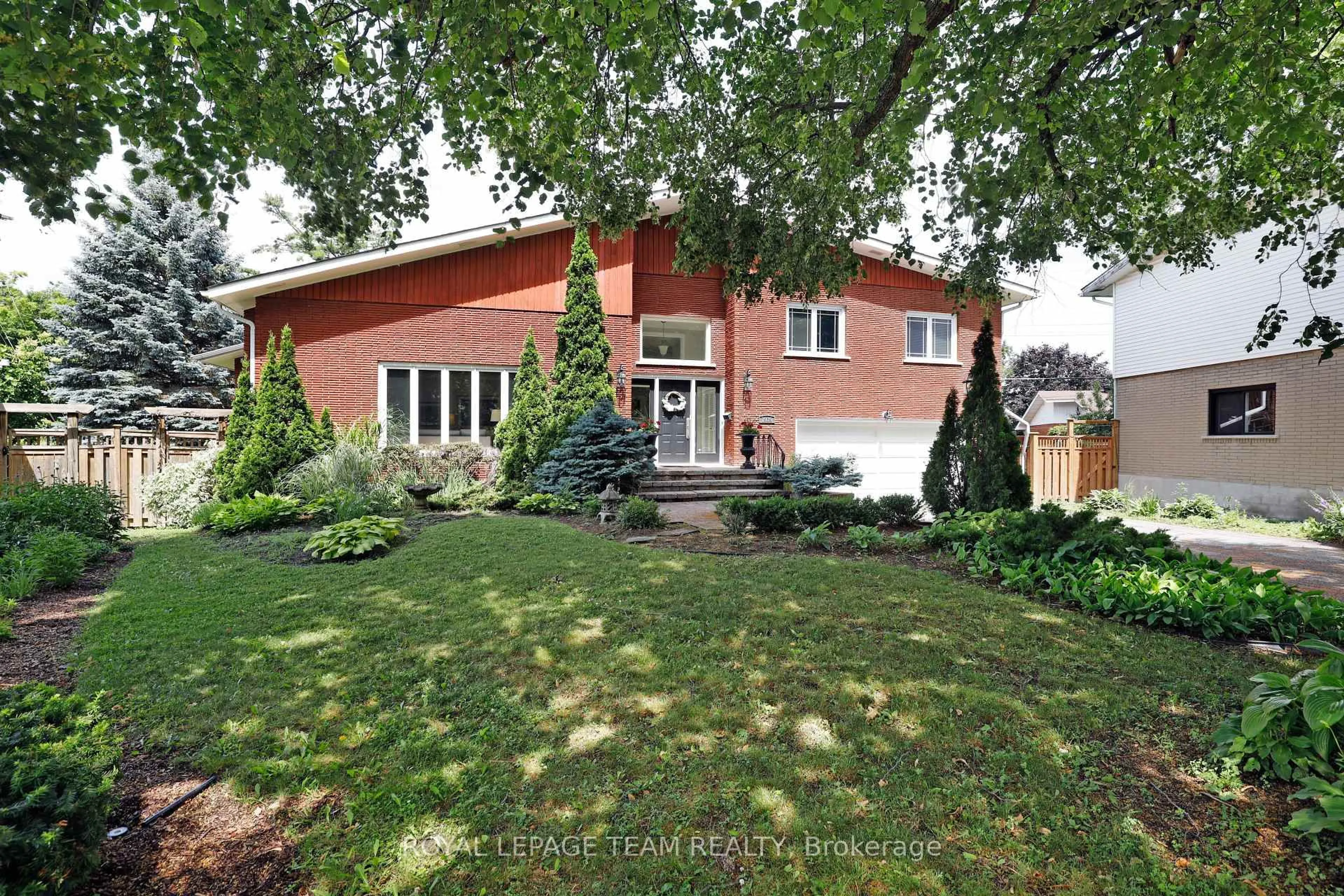 Home with brick exterior material, street for 1939 Wembley Ave, Ottawa Ontario K2A 1A8