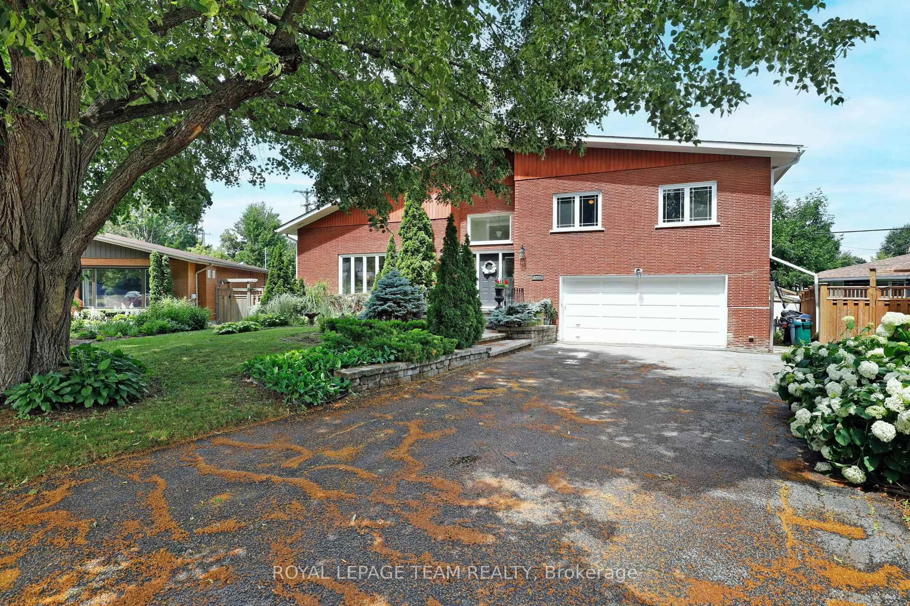 Home with brick exterior material, street for 1939 Wembley Ave, Ottawa Ontario K2A 1A8