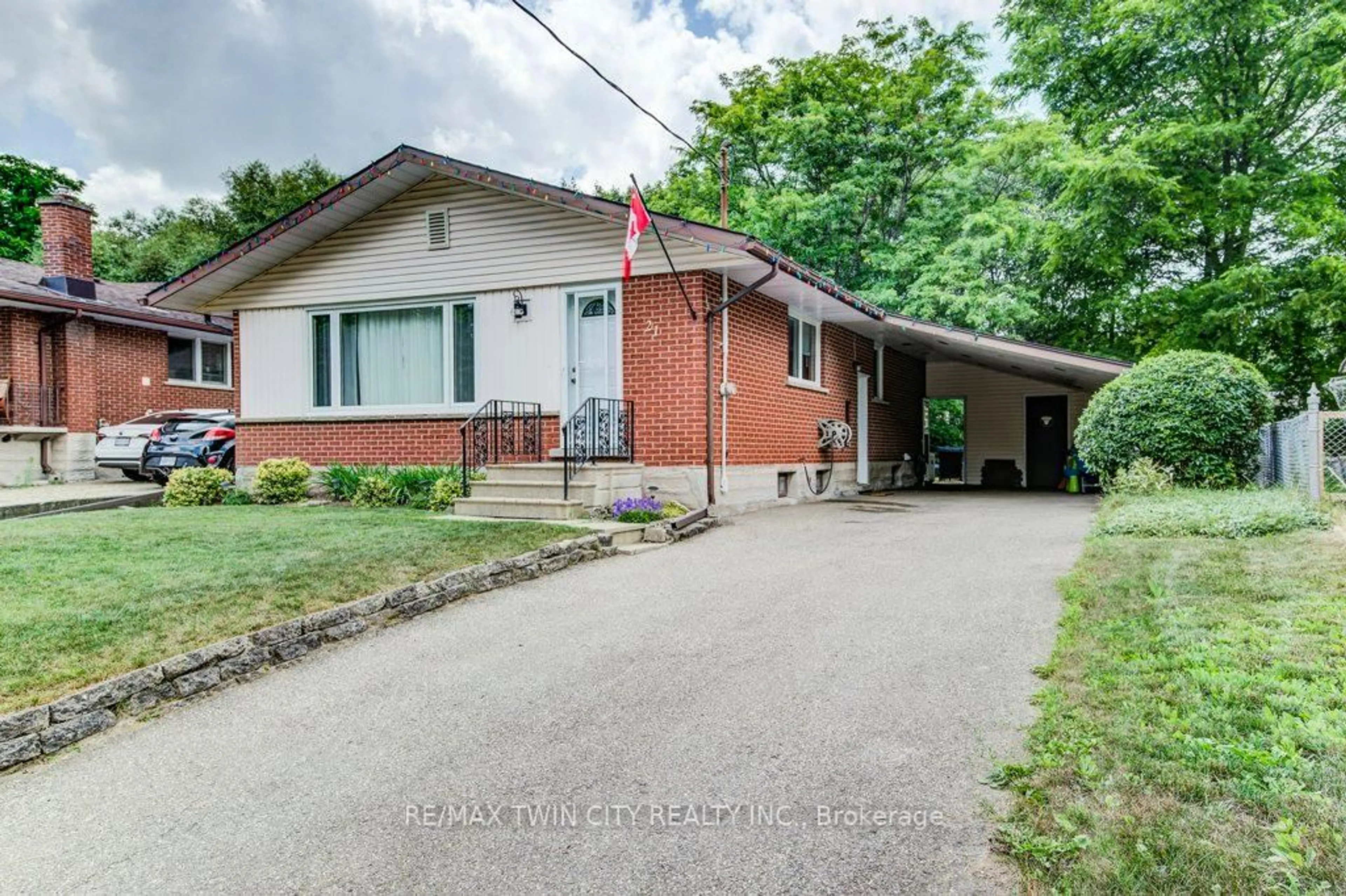 Home with brick exterior material, street for 21 Ruskview Rd, Kitchener Ontario N2M 4S1
