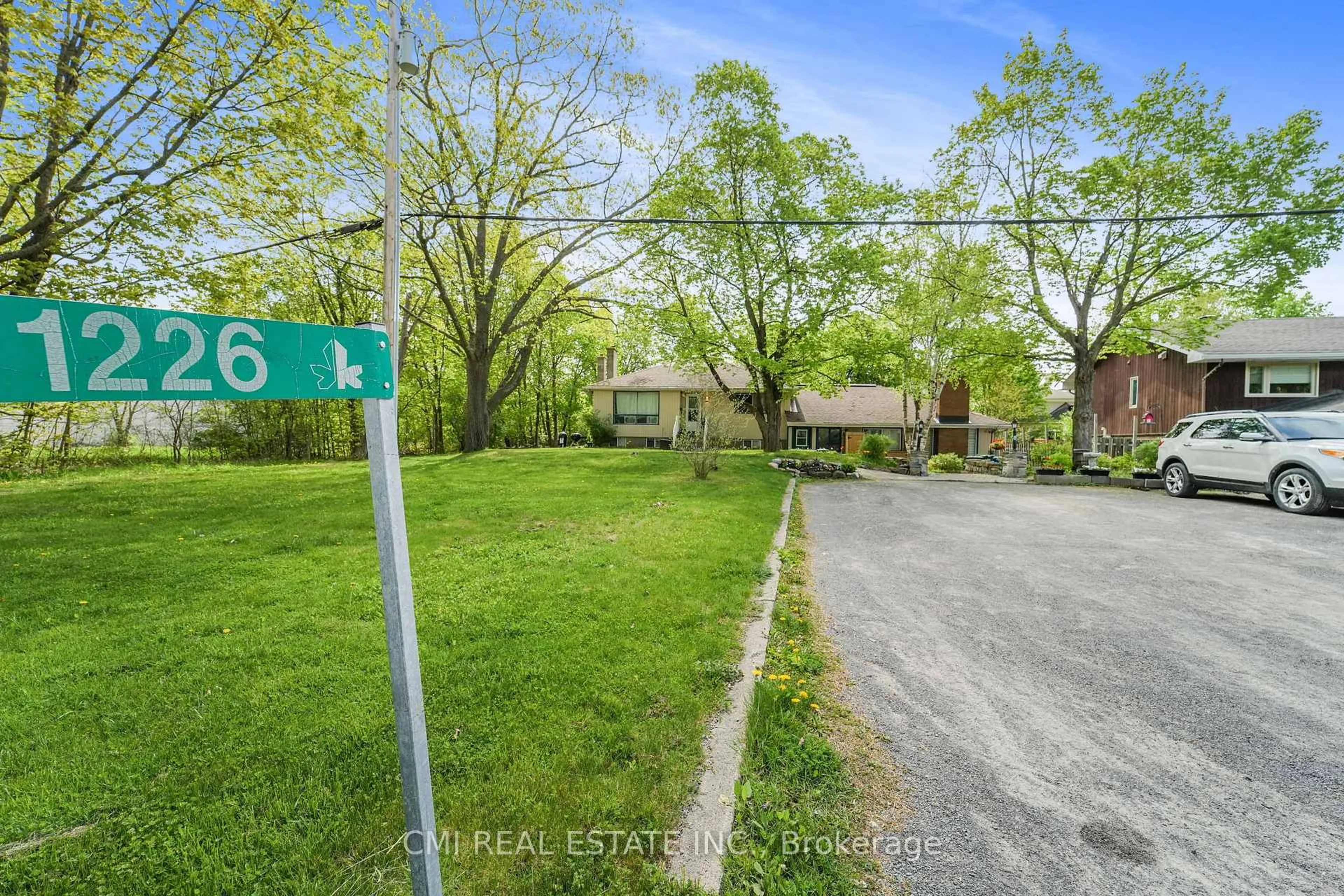 A pic from outside/outdoor area/front of a property/back of a property/a pic from drone, street for 1226 Old Carp Rd, Ottawa Ontario K2K 1X7