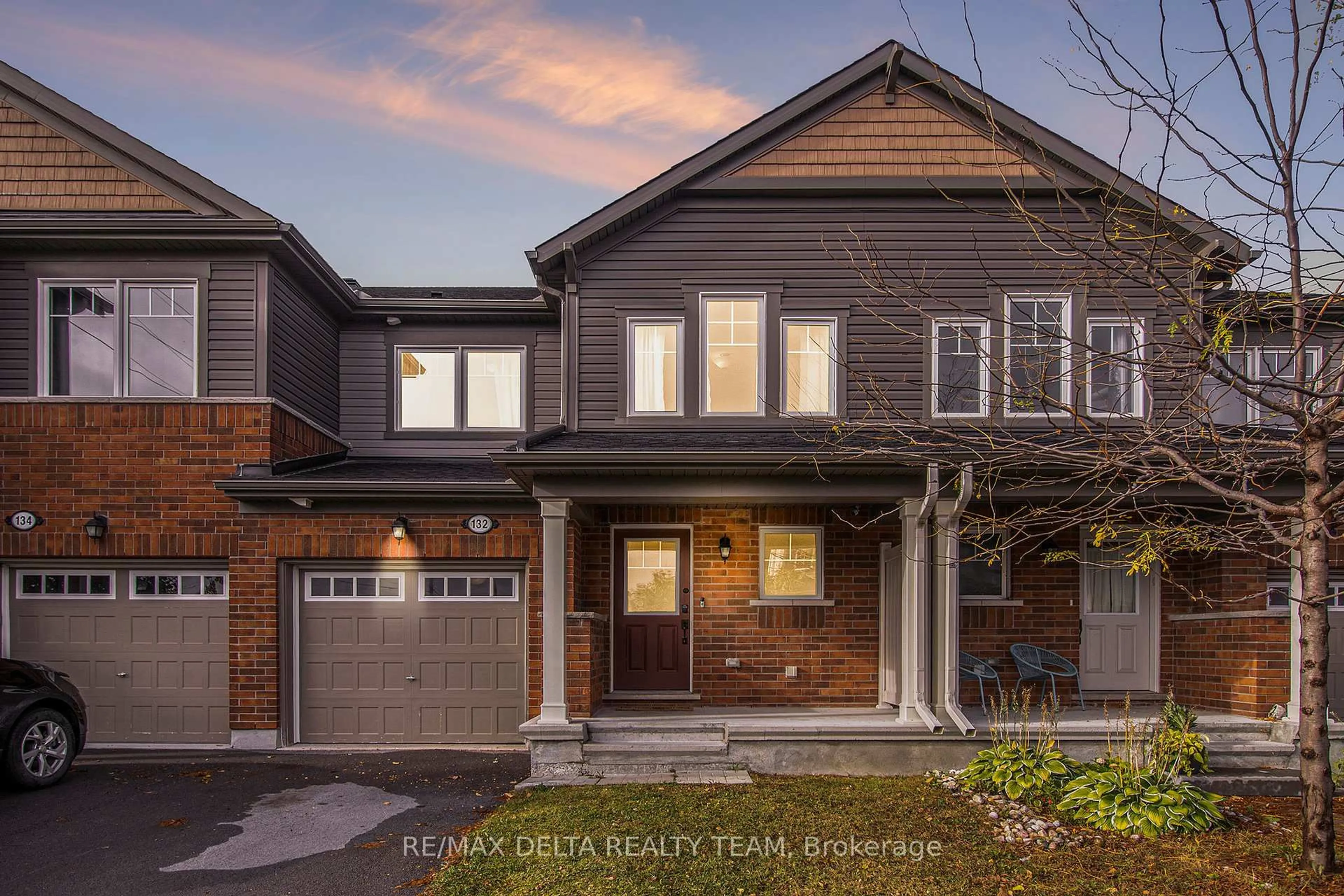 Home with brick exterior material, street for 132 Conifer Creek Circ, Ottawa Ontario K2M 0M2