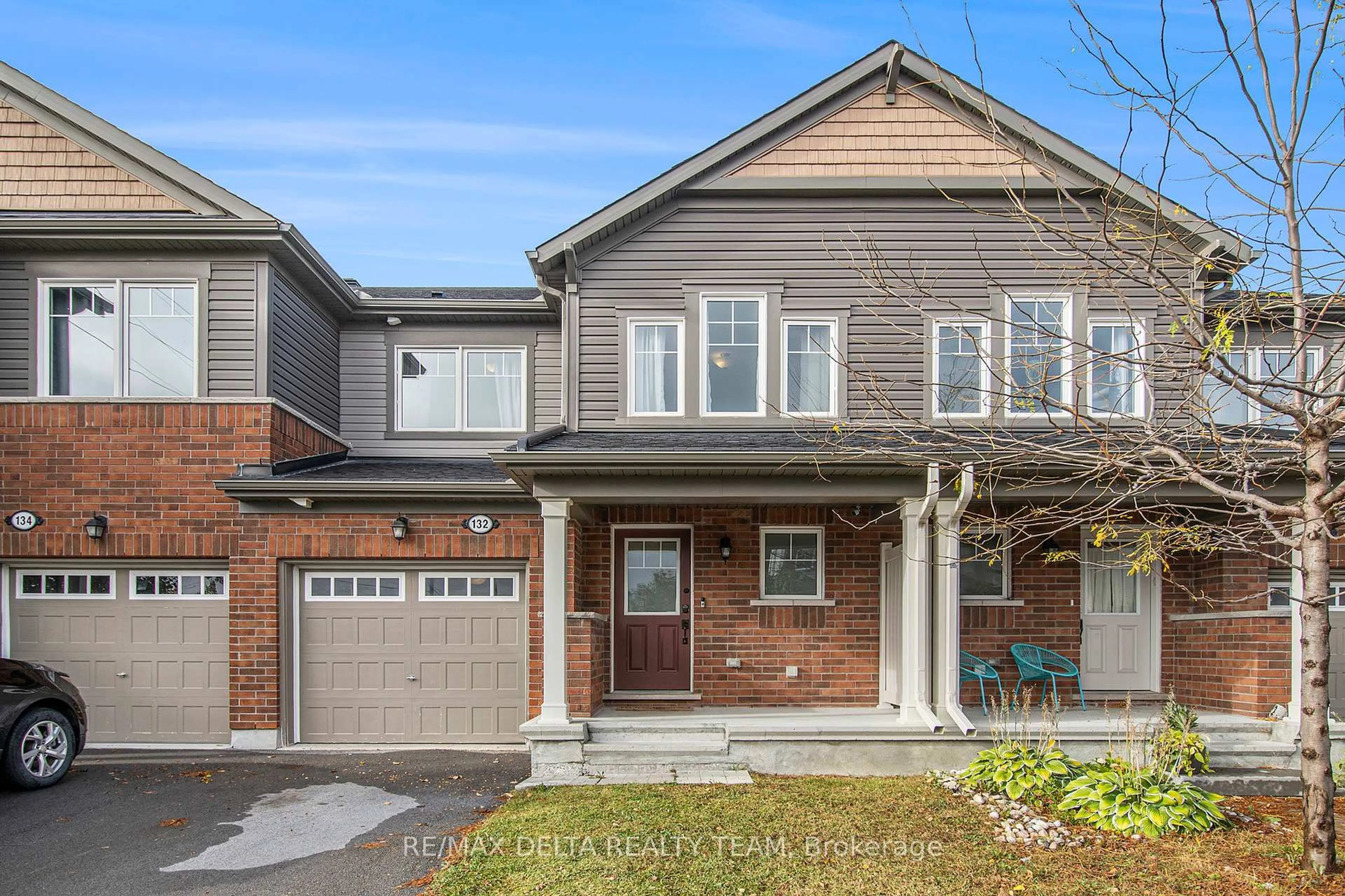 Home with brick exterior material, street for 132 Conifer Creek Circ, Ottawa Ontario K2M 0M2
