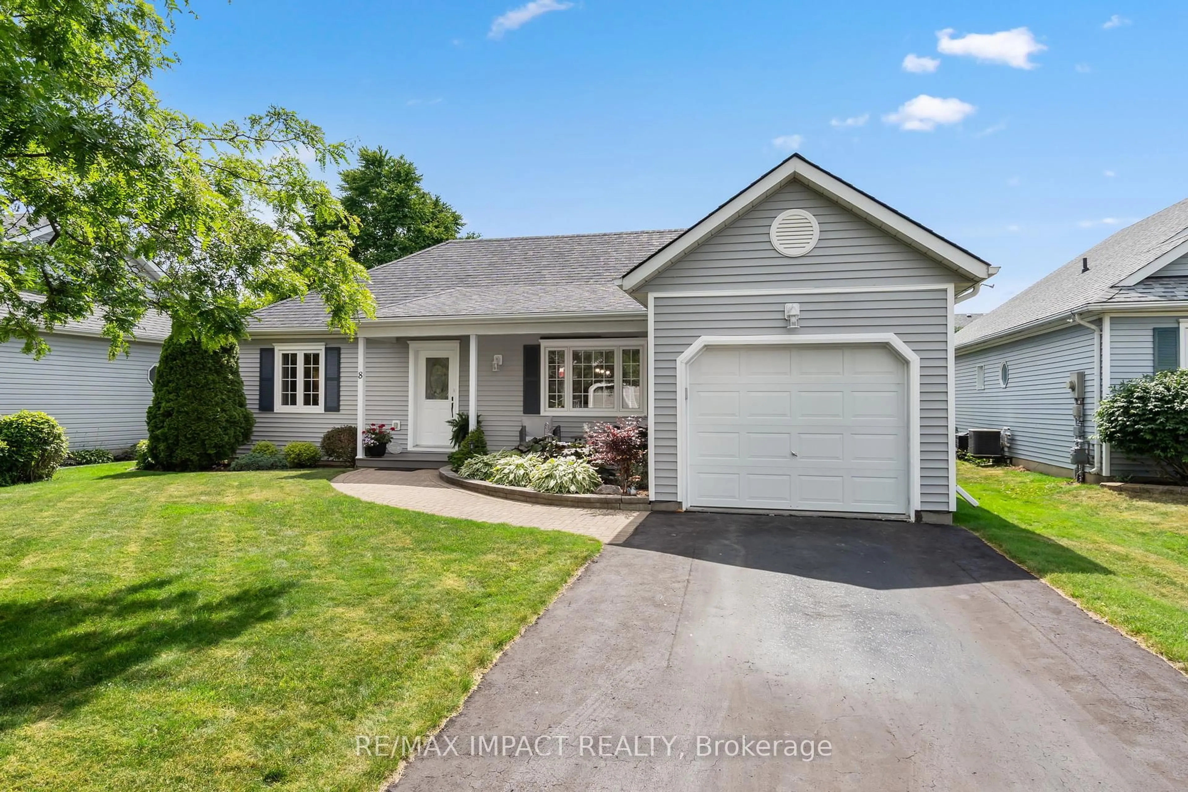Home with vinyl exterior material, street for 8 Lockwood Dr, Brighton Ontario K0K 1H0